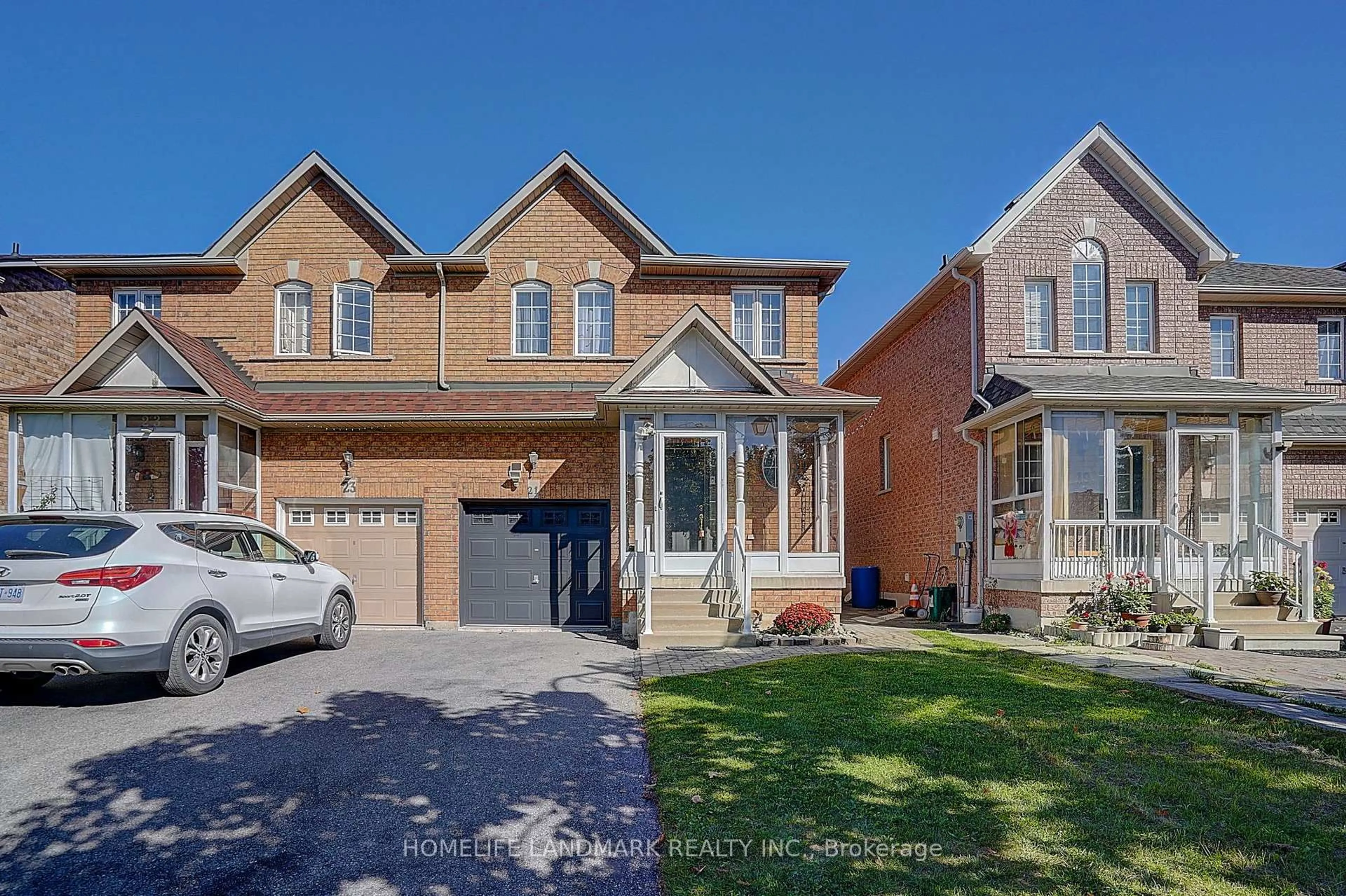 Home with brick exterior material, street for 21 Raintree Dr, Markham Ontario L3R 5T9