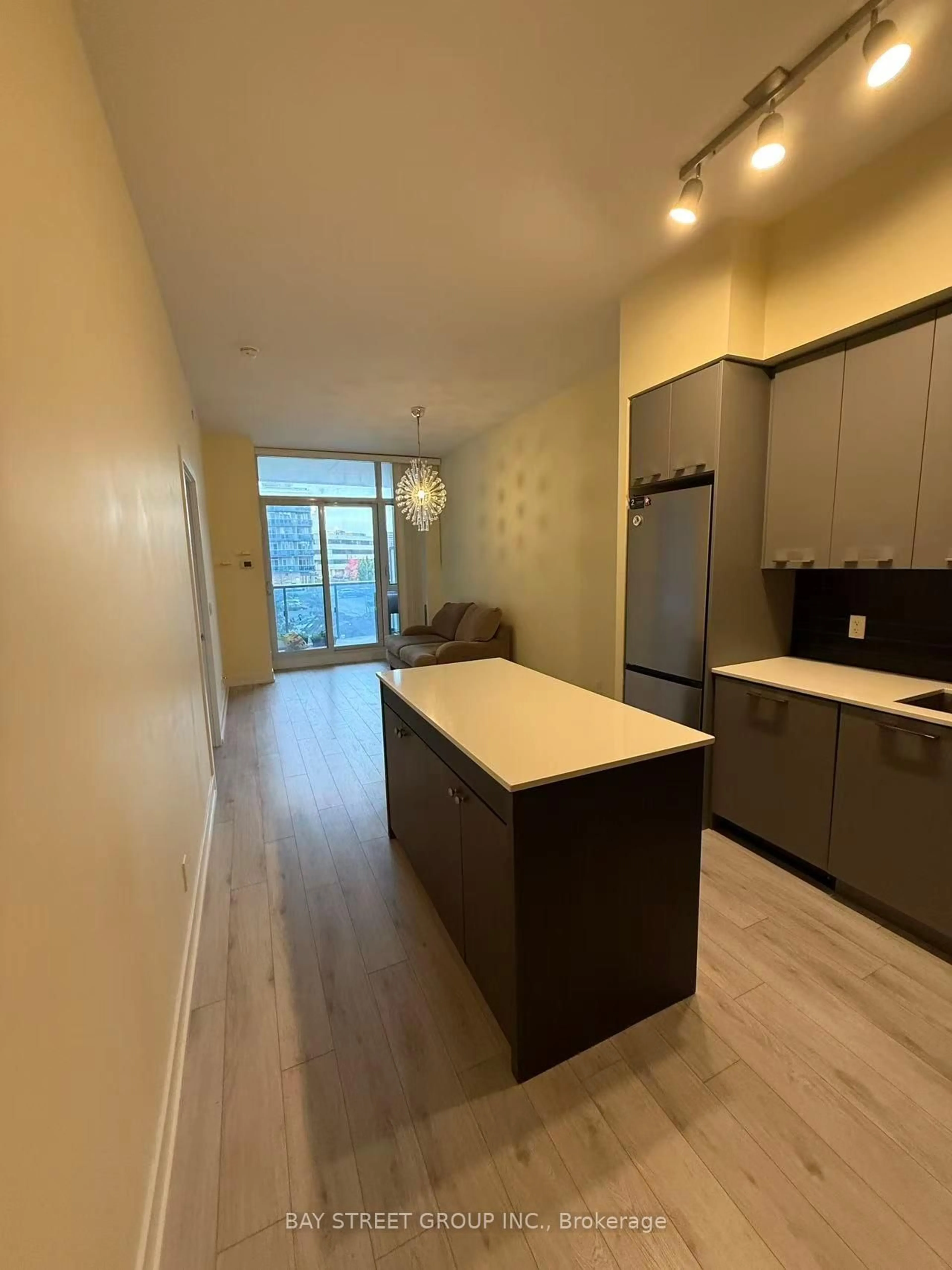 Open concept kitchen, wood/laminate floor for 9471 Yonge St #241, Richmond Hill Ontario L4C 1V4