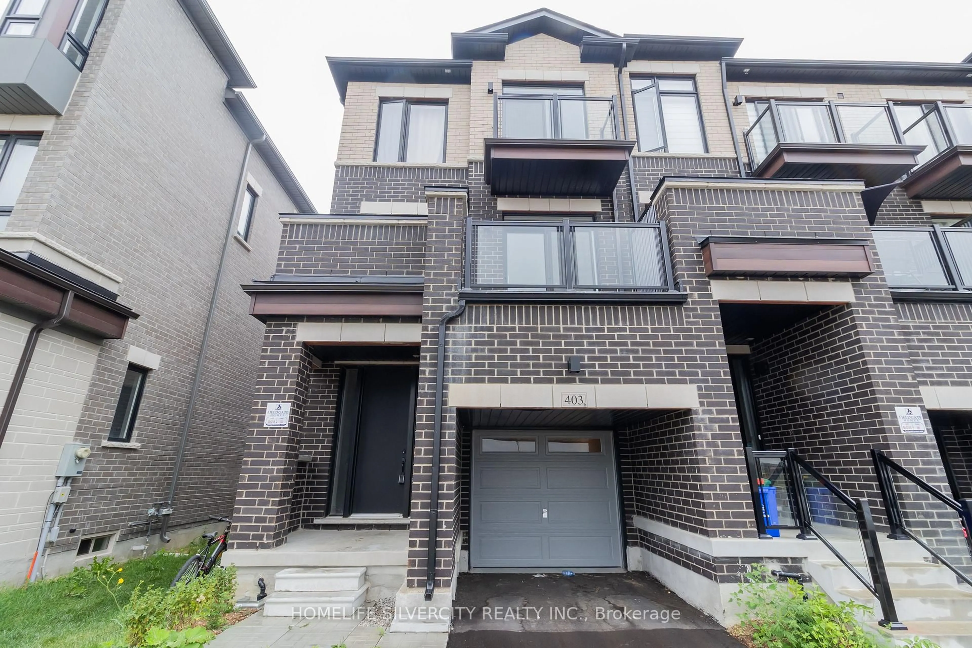 Home with brick exterior material, street for 403 Tennant Circ, Vaughan Ontario L4H 5L2
