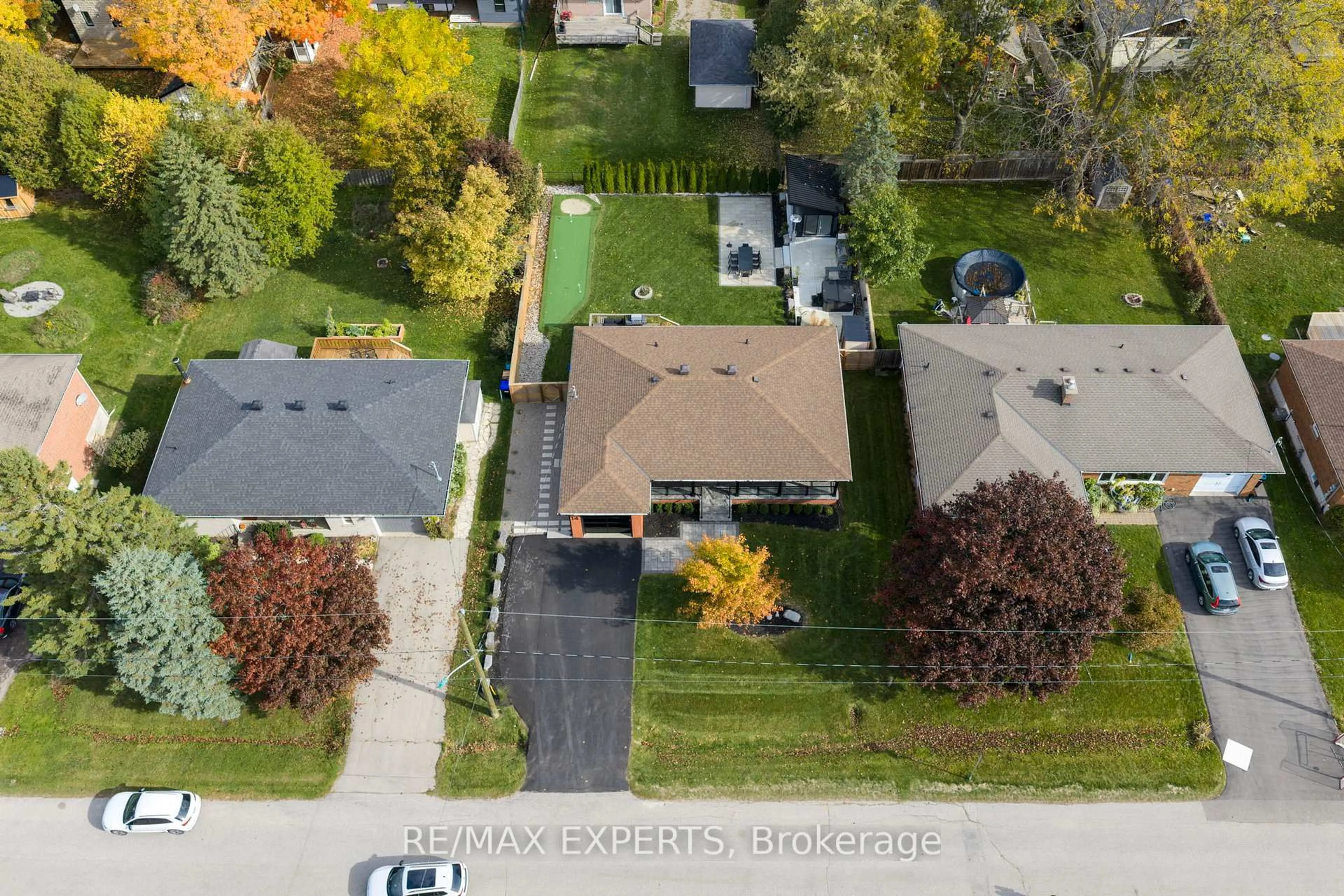 A pic from outside/outdoor area/front of a property/back of a property/a pic from drone, street for 14 Henry St, Essa Ontario L0L 2N0