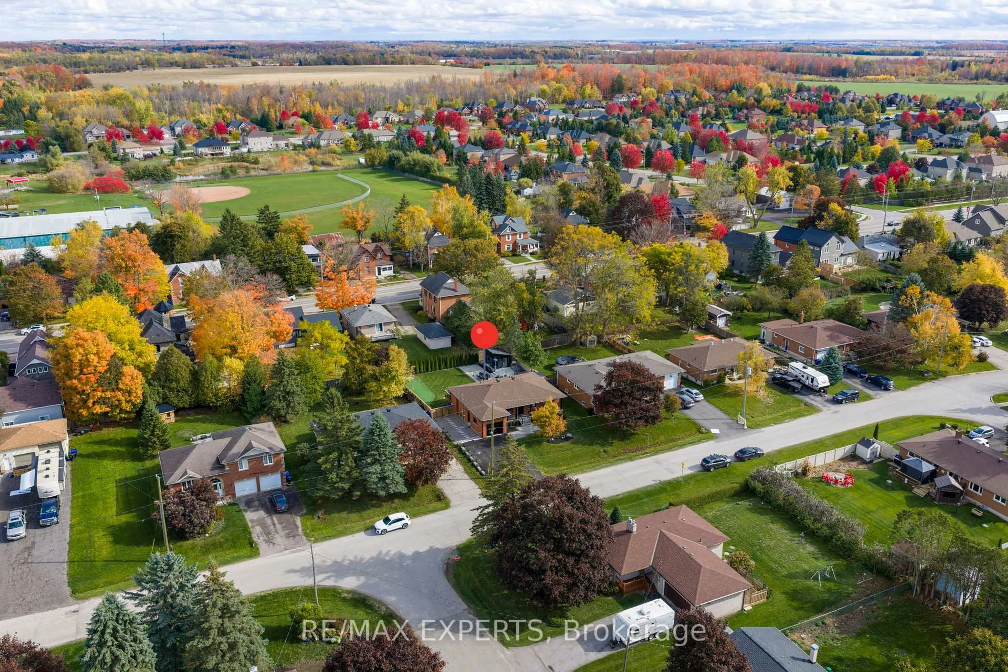 A pic from outside/outdoor area/front of a property/back of a property/a pic from drone, street for 14 Henry St, Essa Ontario L0L 2N0