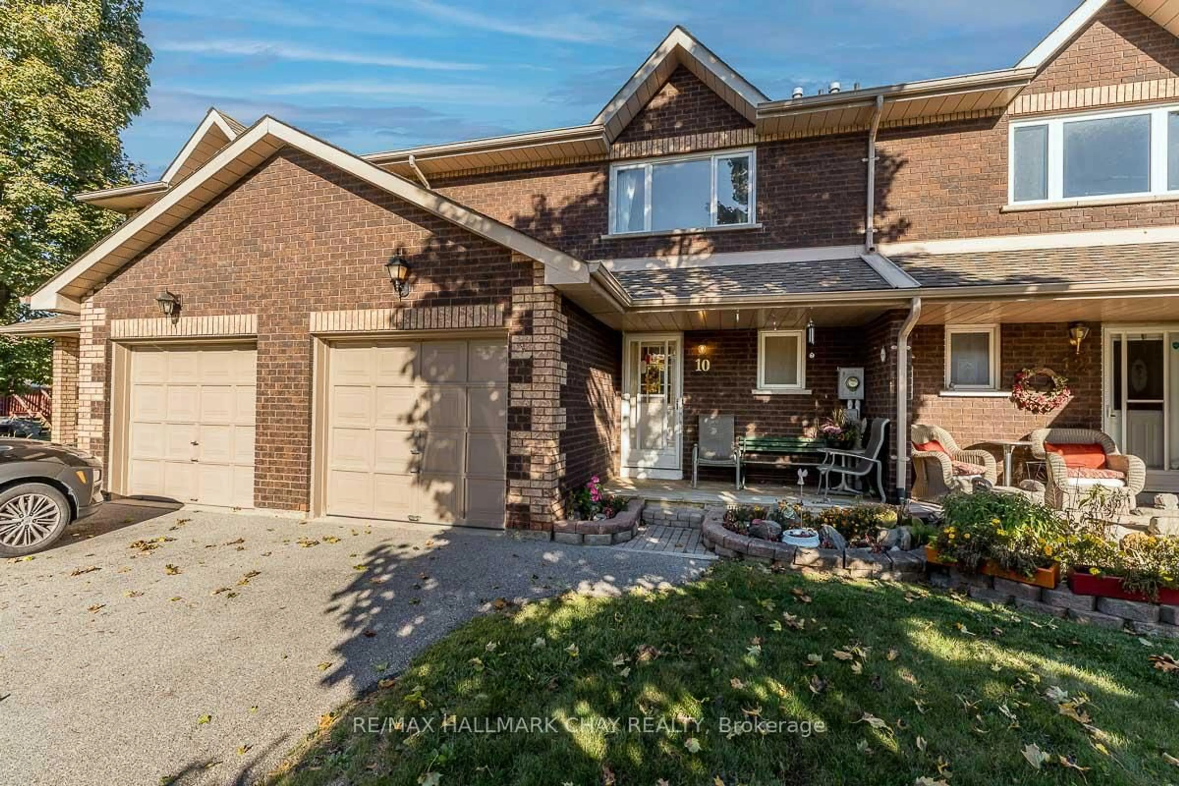 Home with brick exterior material, street for 10 Riverley Lane #2, New Tecumseth Ontario L9R 1C5