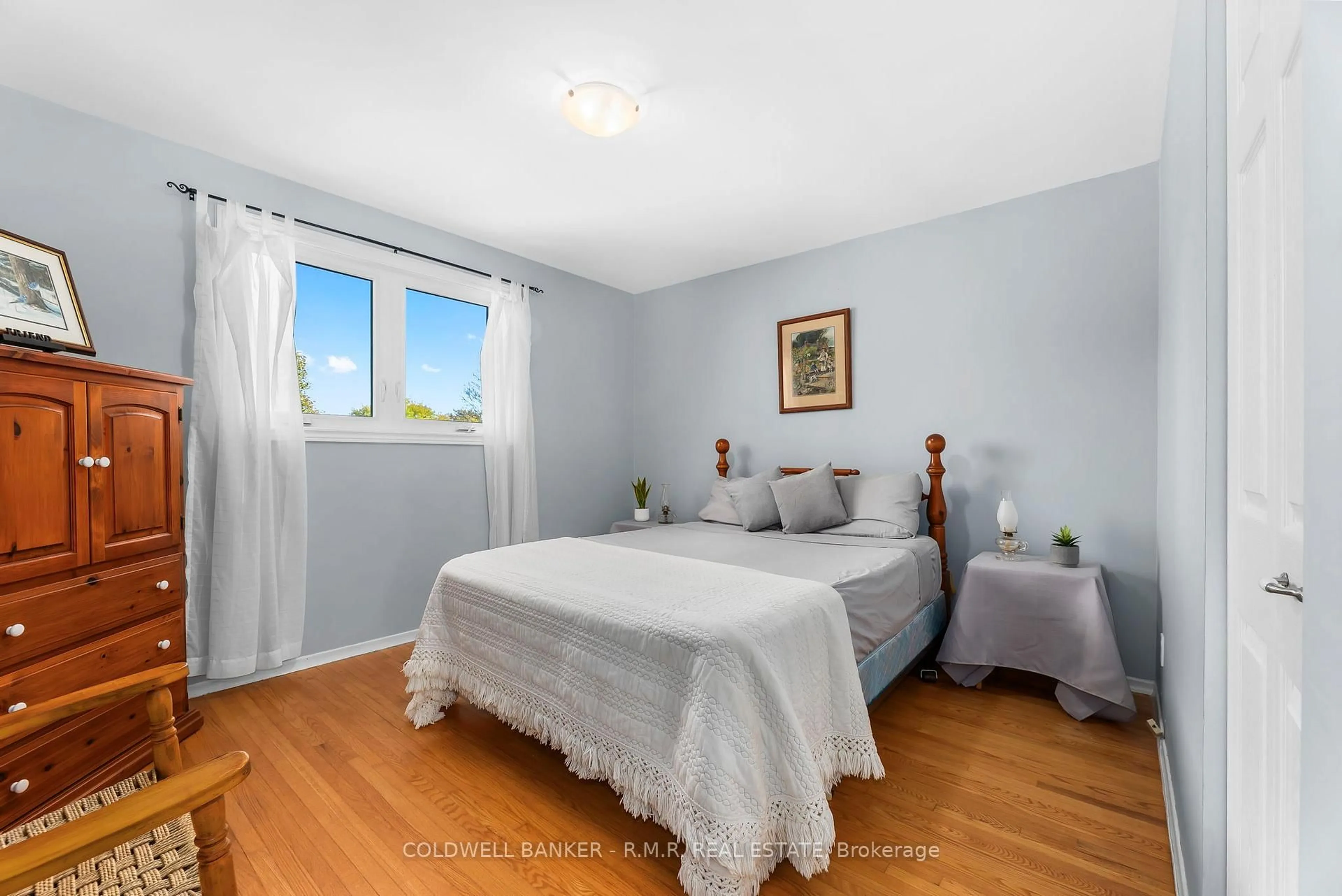 Bedroom with bed, wood/laminate floor for 93 Cedar St, Uxbridge Ontario L9P 1B2