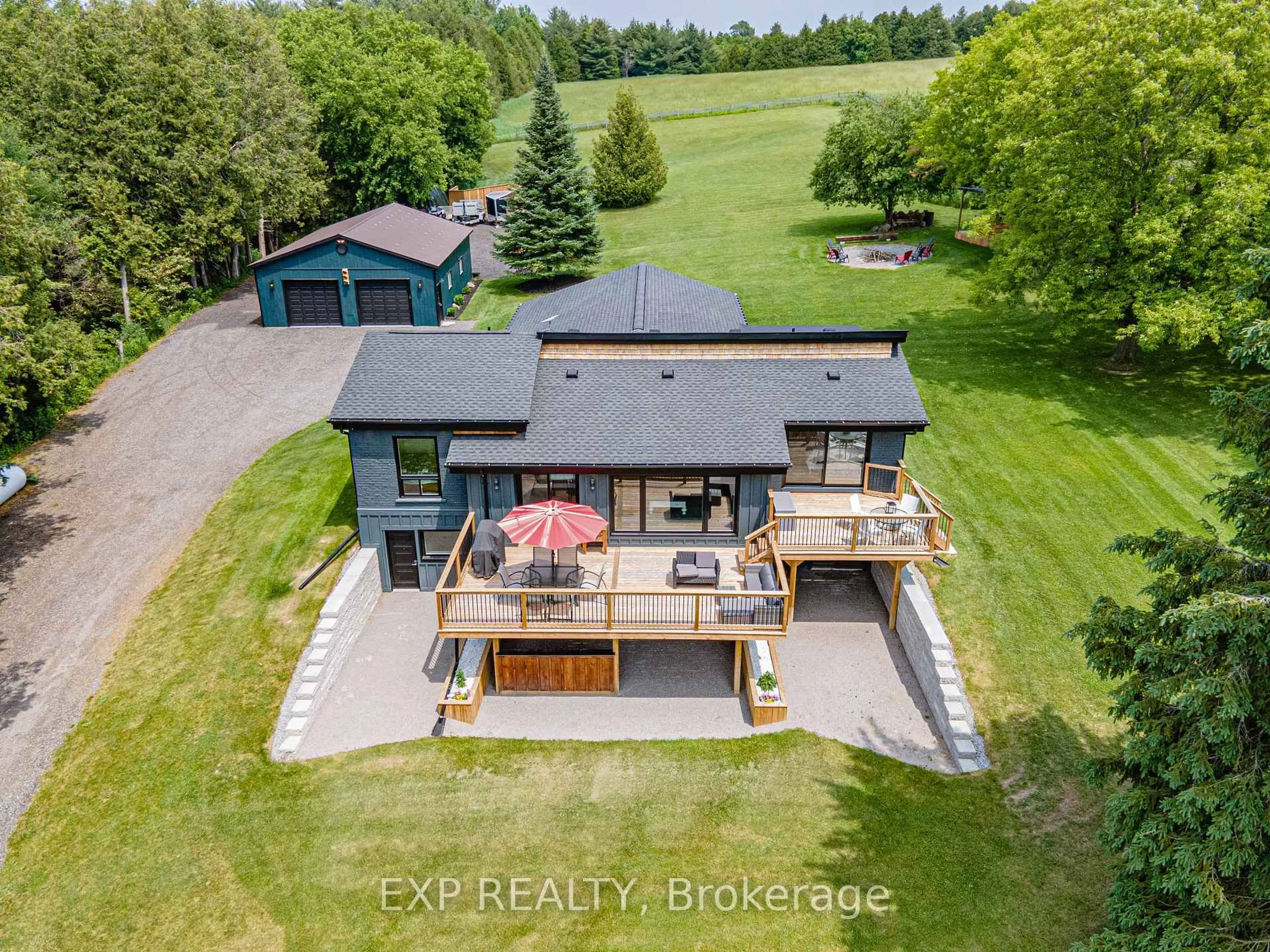 A pic from outside/outdoor area/front of a property/back of a property/a pic from drone, water/lake/river/ocean view for 12329 York Durham Line, Uxbridge Ontario L0E 1T0