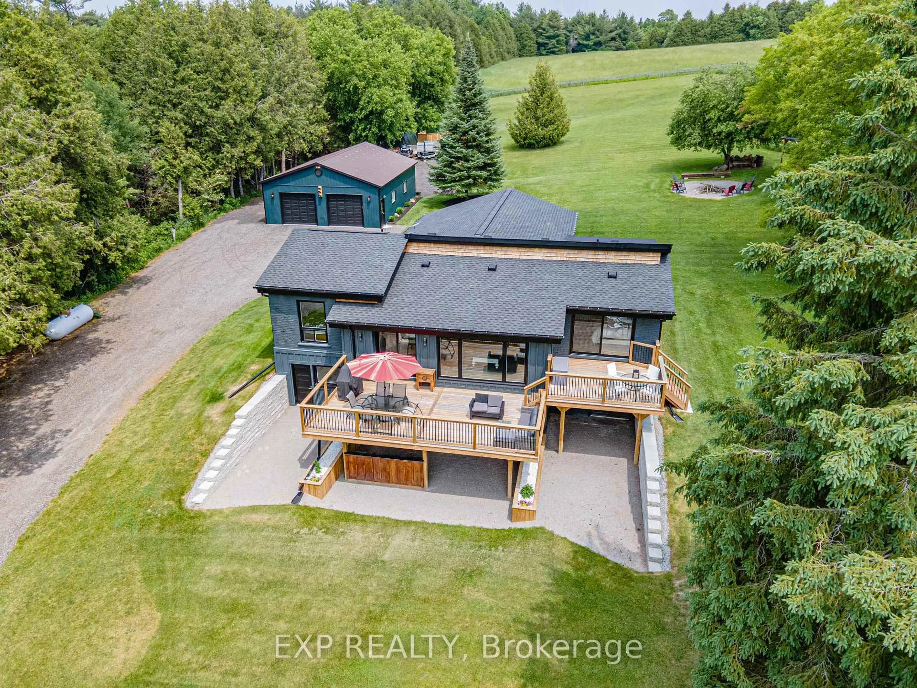 A pic from outside/outdoor area/front of a property/back of a property/a pic from drone, water/lake/river/ocean view for 12329 York Durham Line, Uxbridge Ontario L0E 1T0
