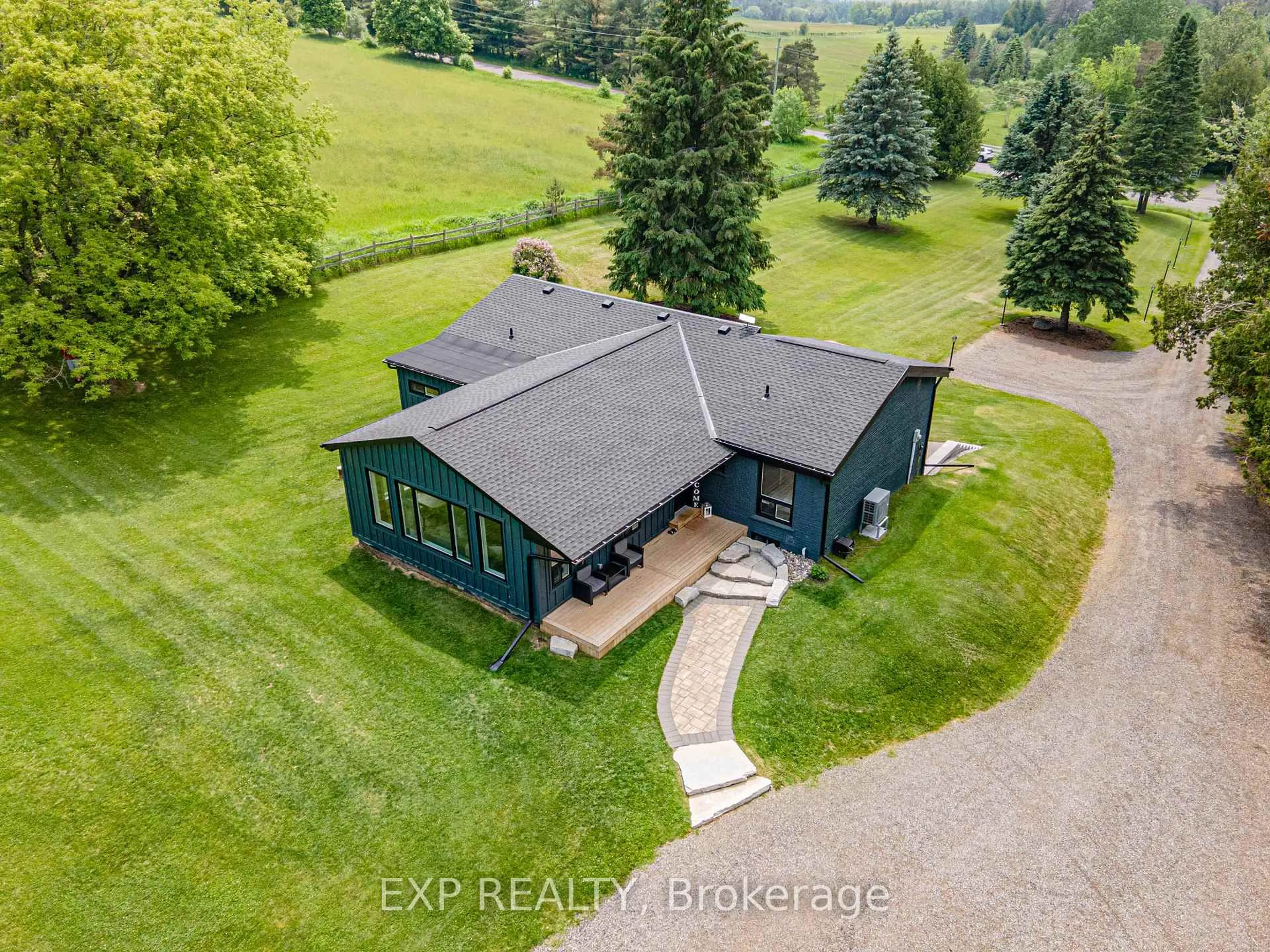 A pic from outside/outdoor area/front of a property/back of a property/a pic from drone, water/lake/river/ocean view for 12329 York Durham Line, Uxbridge Ontario L0E 1T0