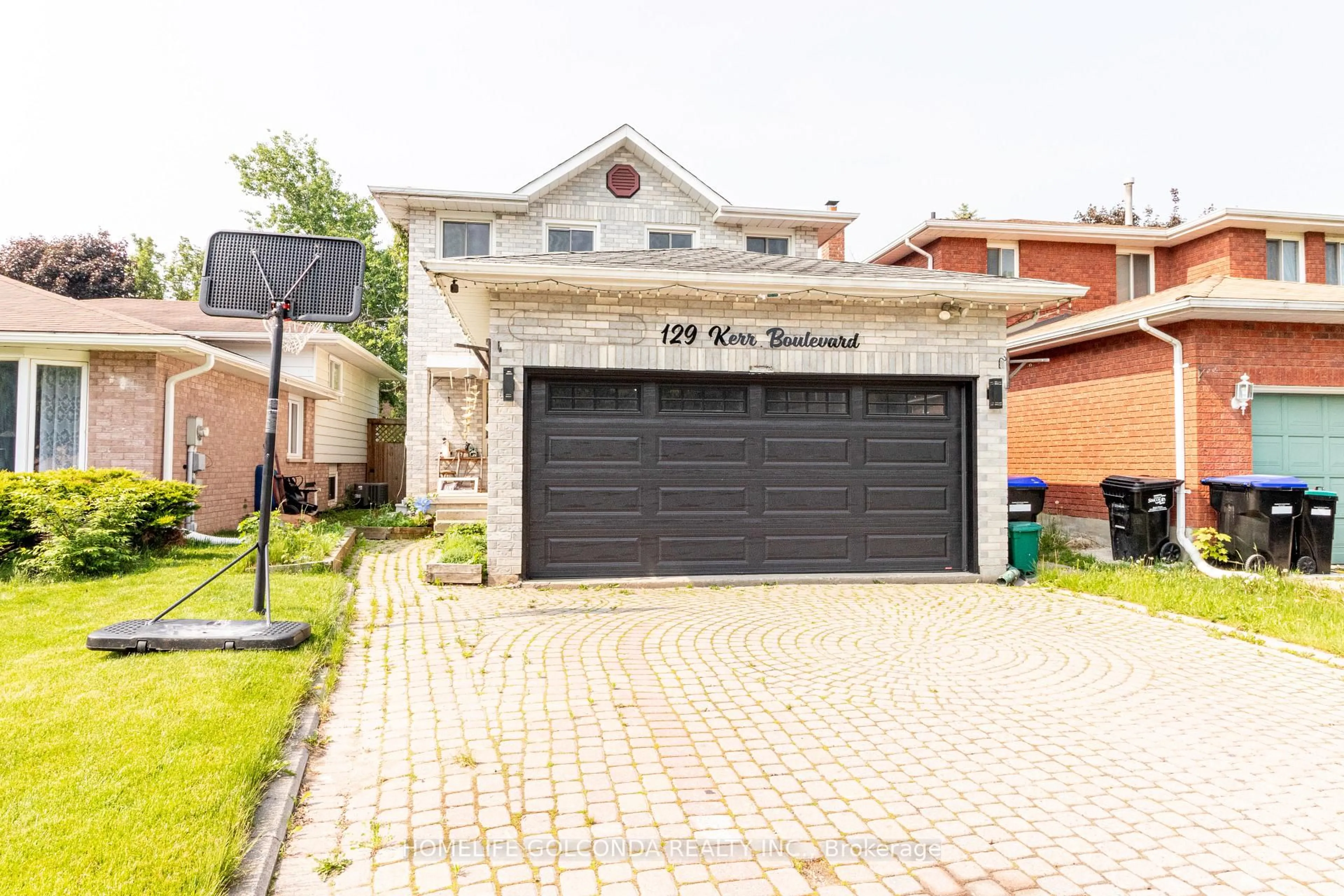 Home with brick exterior material, street for 129 Kerr Blvd, New Tecumseth Ontario L9R 1C7