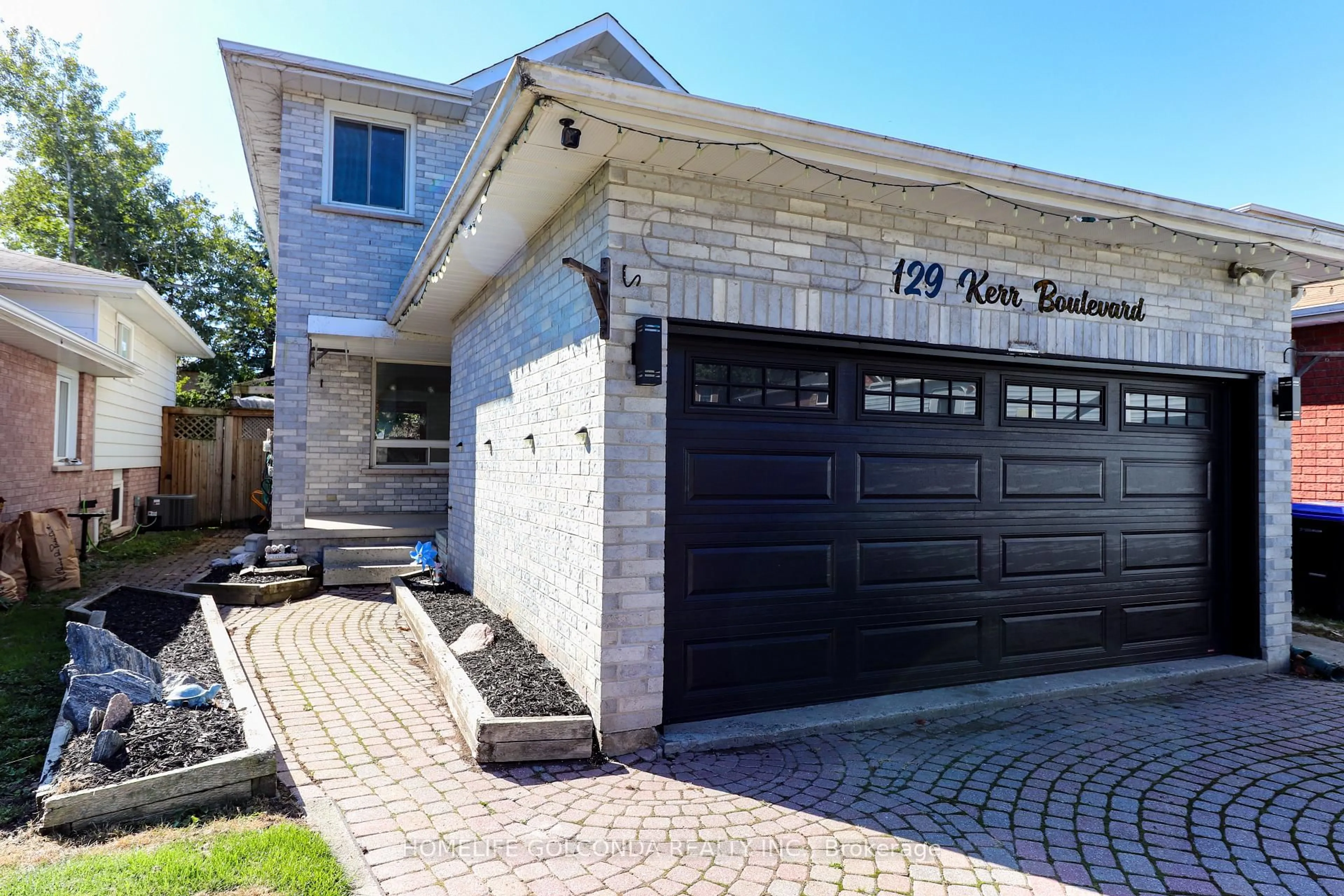 Home with brick exterior material, street for 129 Kerr Blvd, New Tecumseth Ontario L9R 1C7