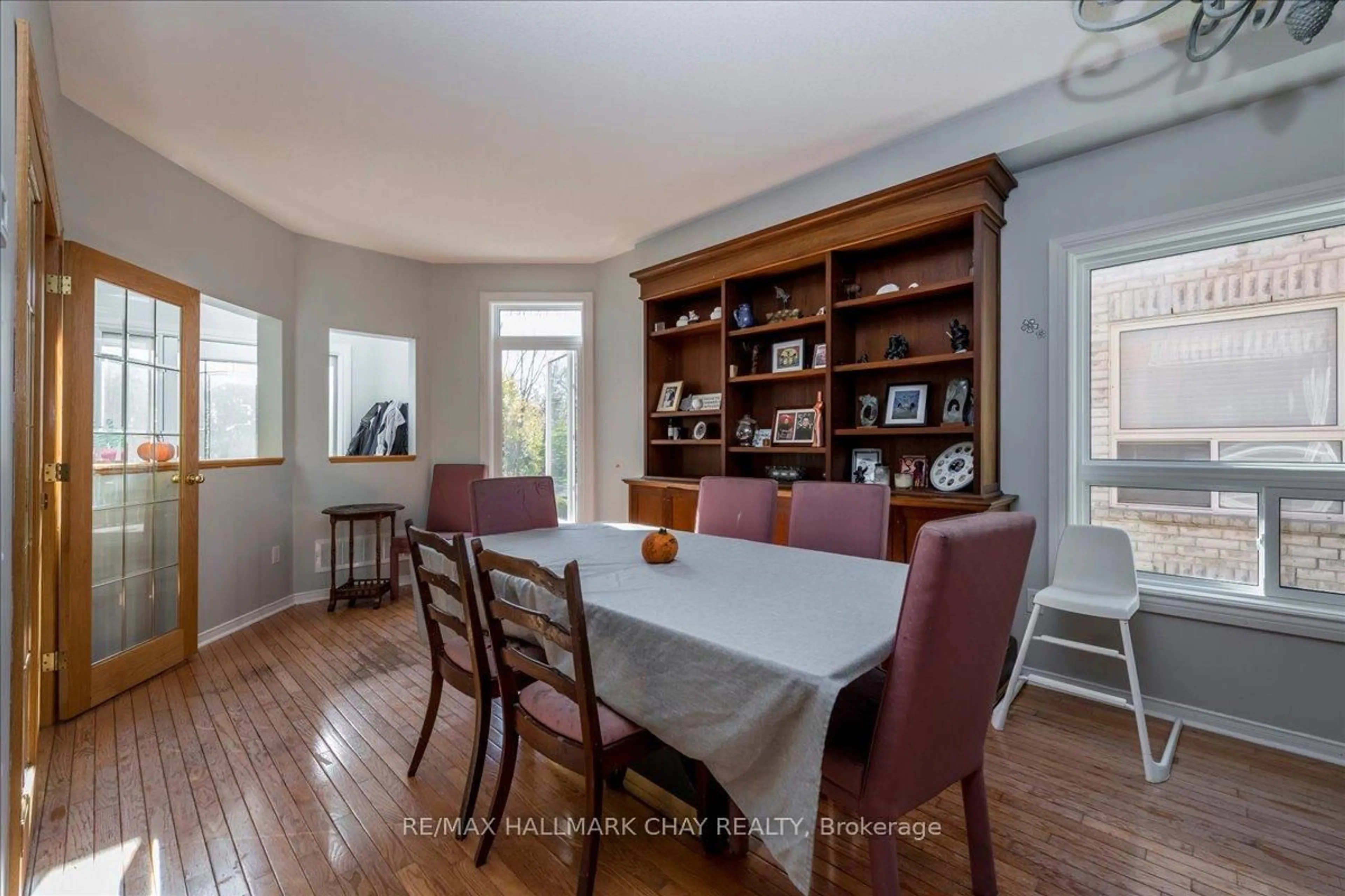 Dining room, wood/laminate floor for 1967 WILSON St, Innisfil Ontario L9S 2A1