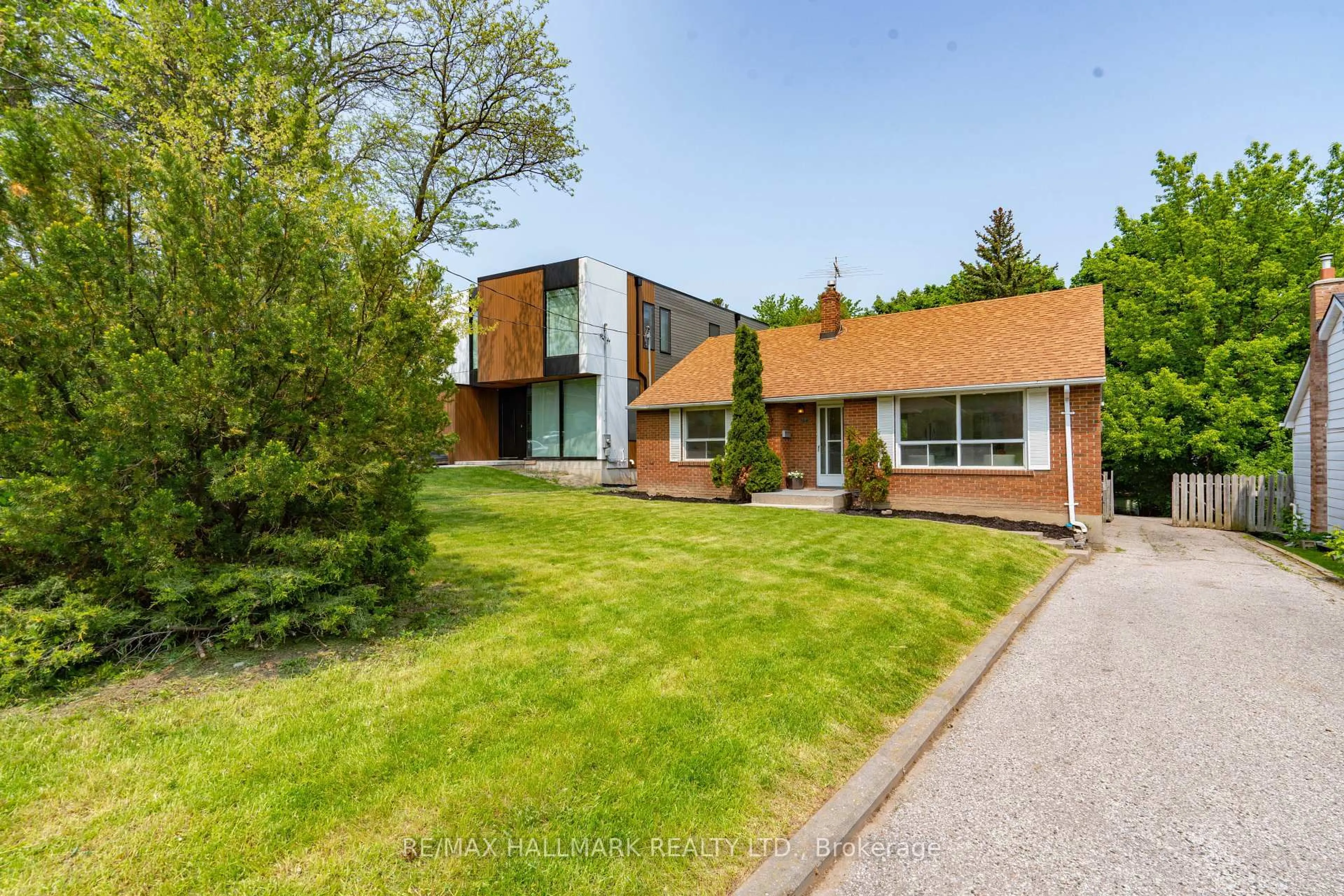 Home with brick exterior material, street for 104 Highland Park Blvd, Markham Ontario L3T 1B7