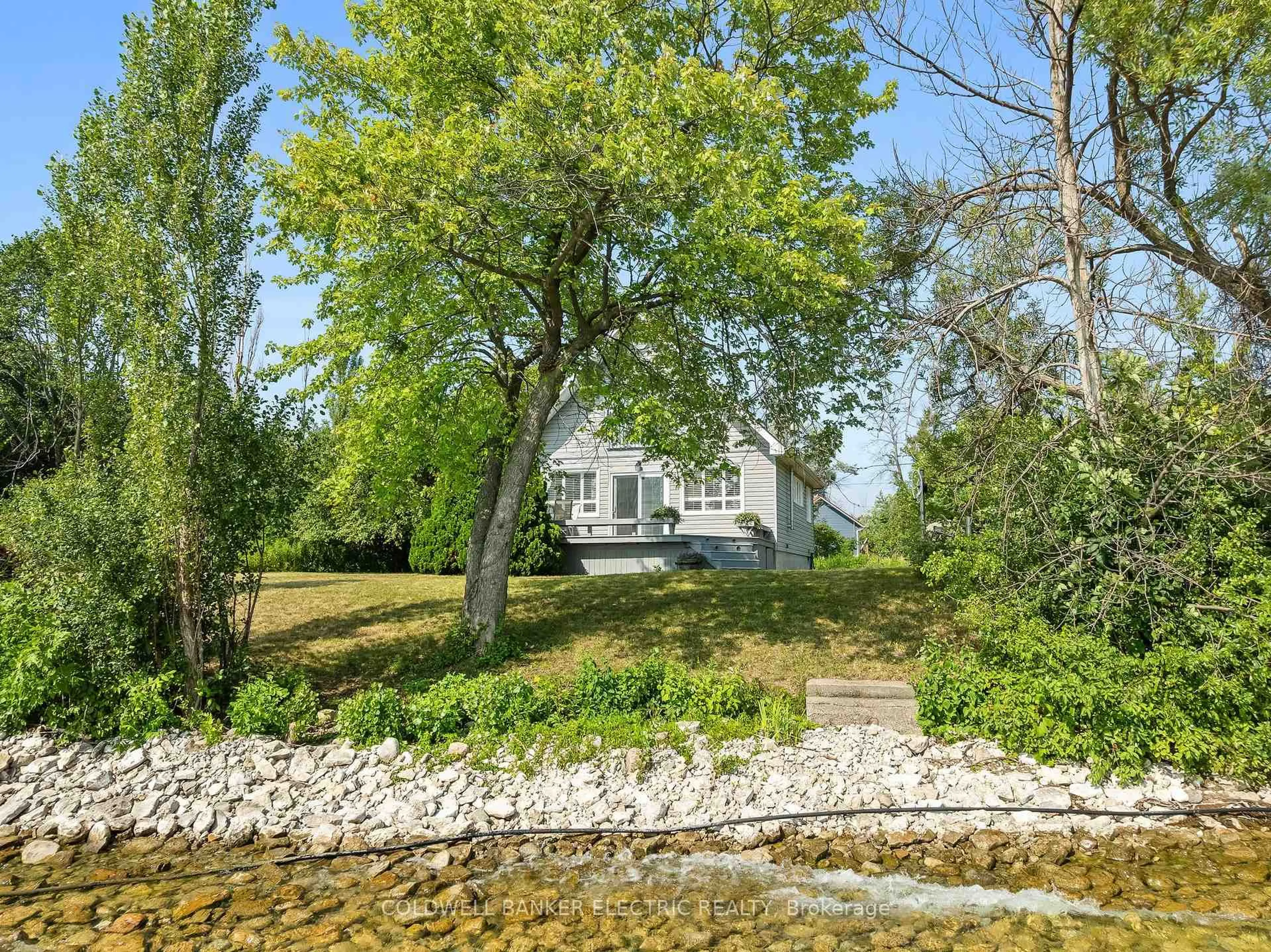 A pic from outside/outdoor area/front of a property/back of a property/a pic from drone, water/lake/river/ocean view for 1481 Beaver Rd, Georgina Islands Ontario L0E 1R0