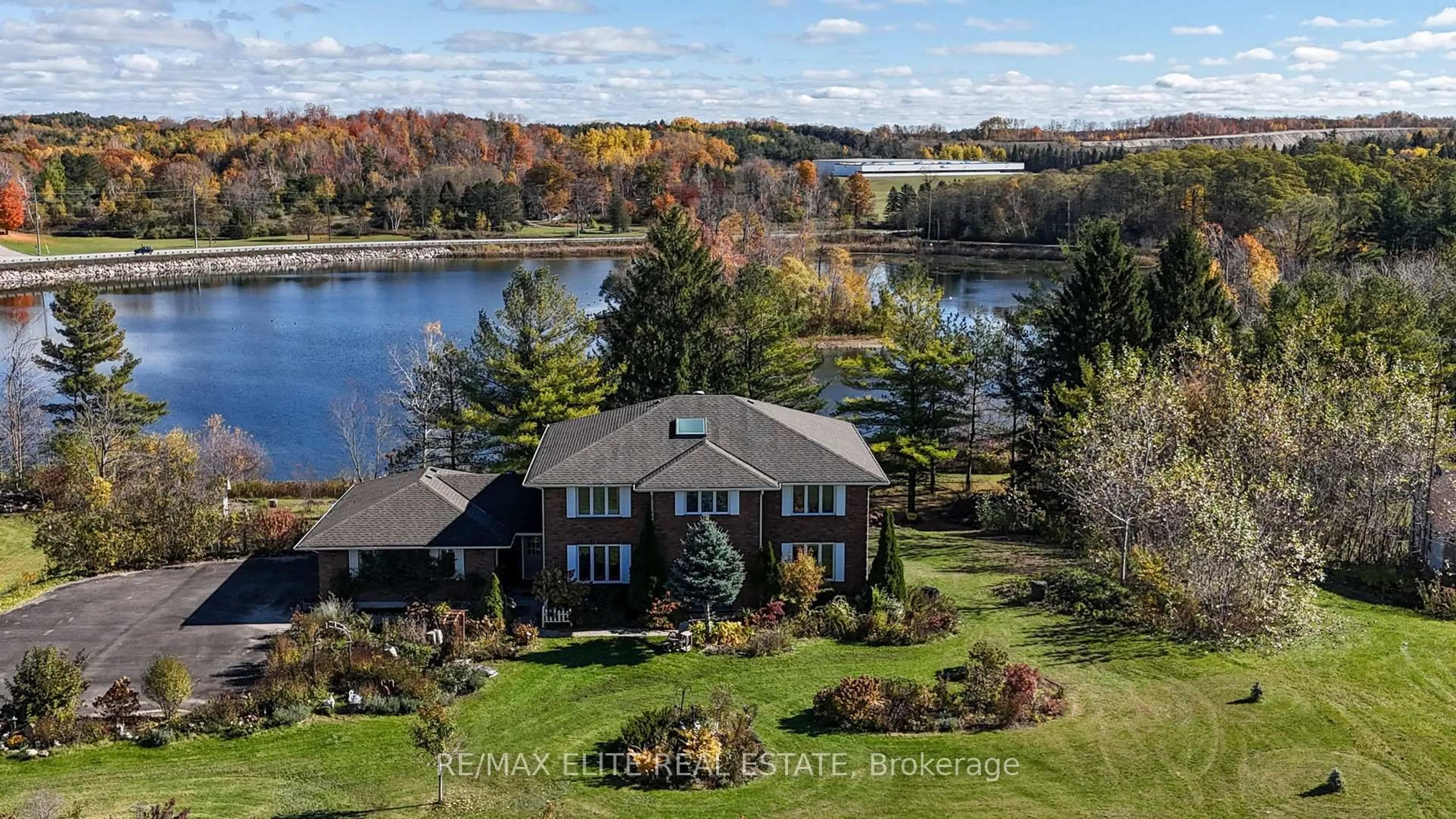 A pic from outside/outdoor area/front of a property/back of a property/a pic from drone, water/lake/river/ocean view for 9 Island Lake Dr, Whitchurch-Stouffville Ontario L4A 3G7