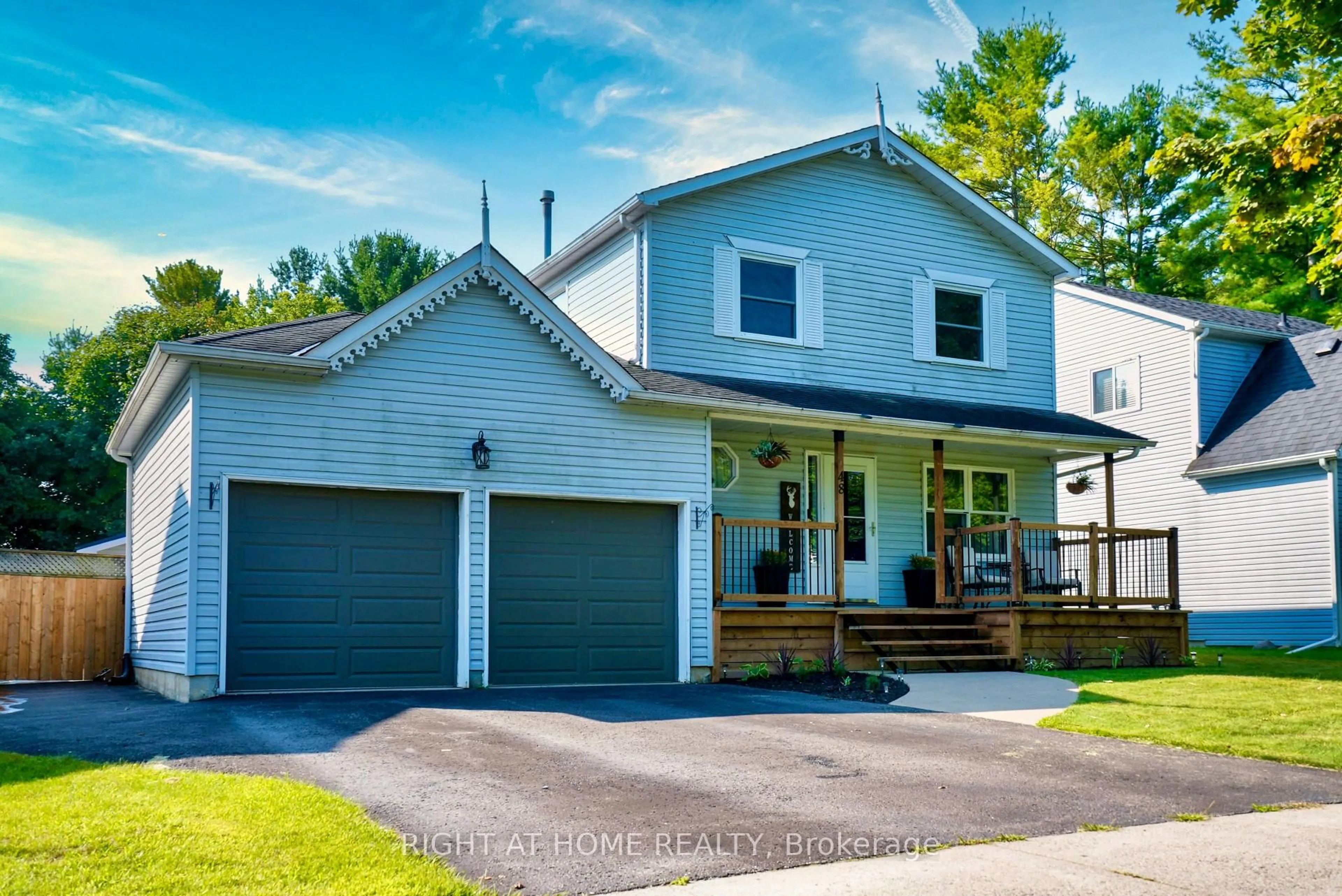 Home with vinyl exterior material, street for 48 Michael St St, Essa Ontario L0M 1B2