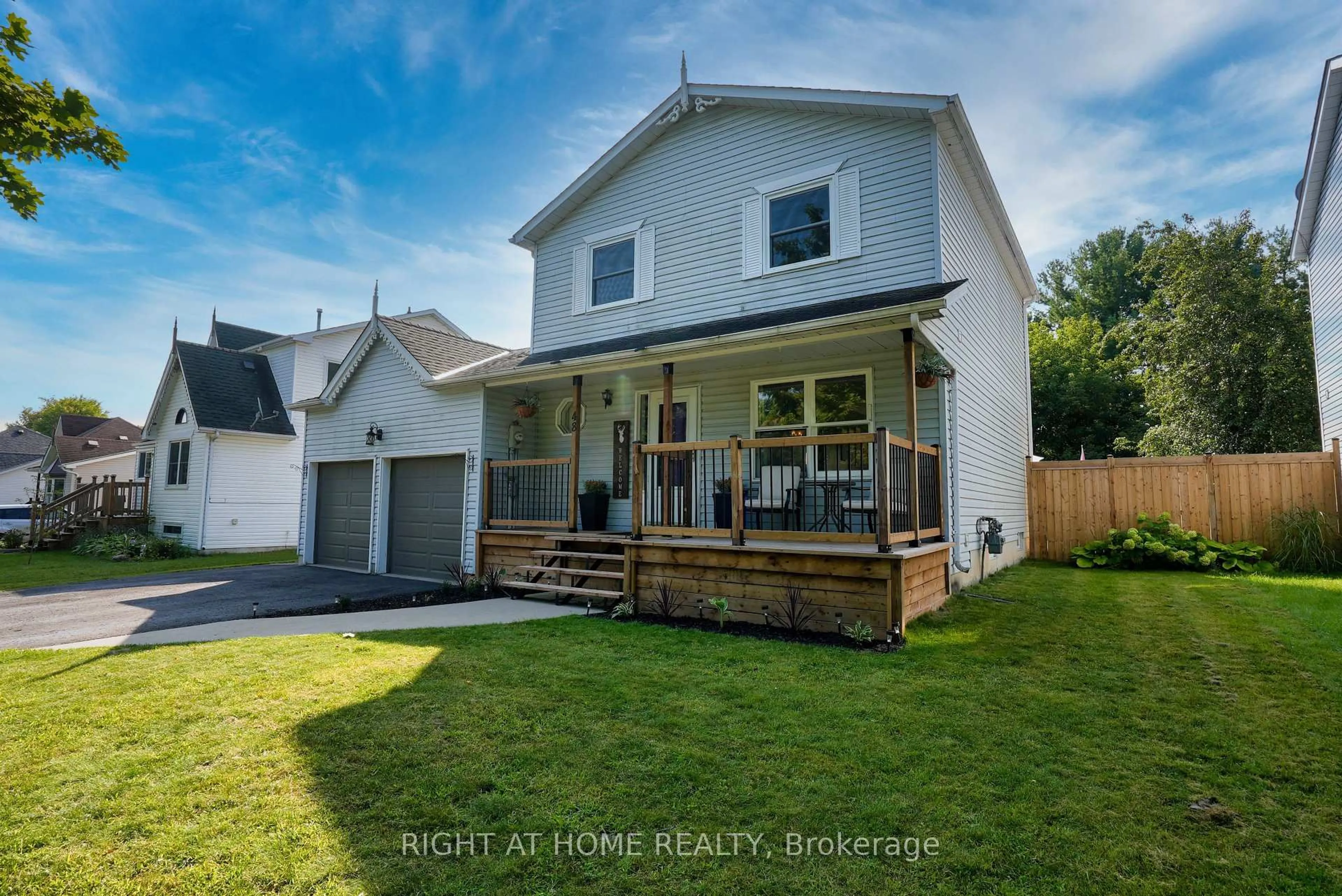 Home with vinyl exterior material, street for 48 Michael St St, Essa Ontario L0M 1B2