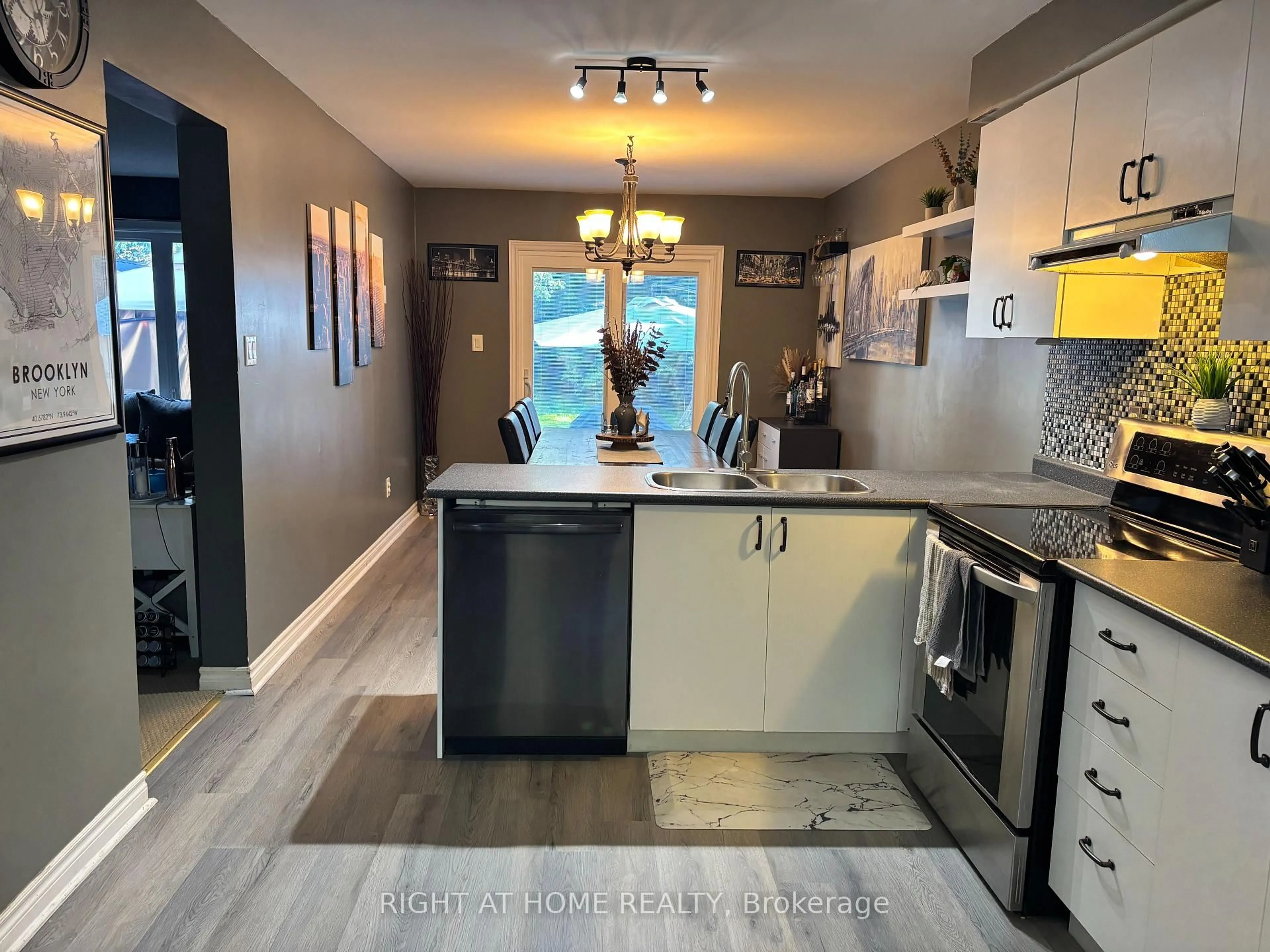 Open concept kitchen, ceramic/tile floor for 48 Michael St St, Essa Ontario L0M 1B2