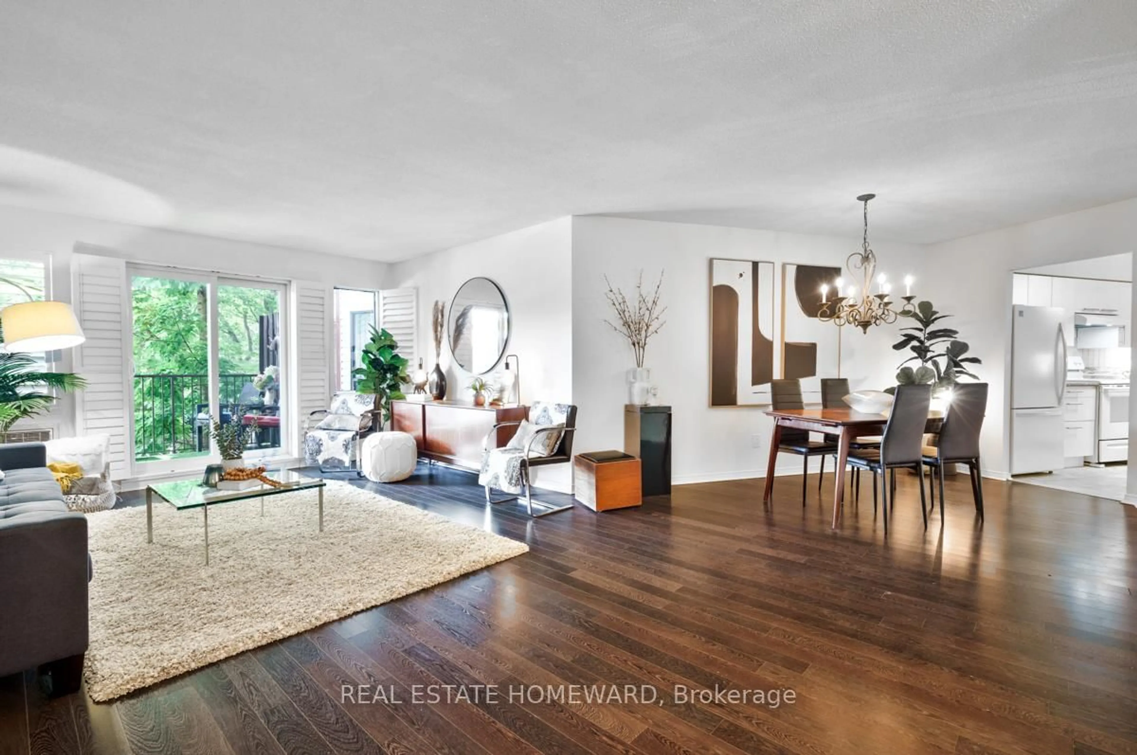 Living room with furniture, wood/laminate floor for 111 Grew Blvd #208, Georgina Ontario L0E 1L0