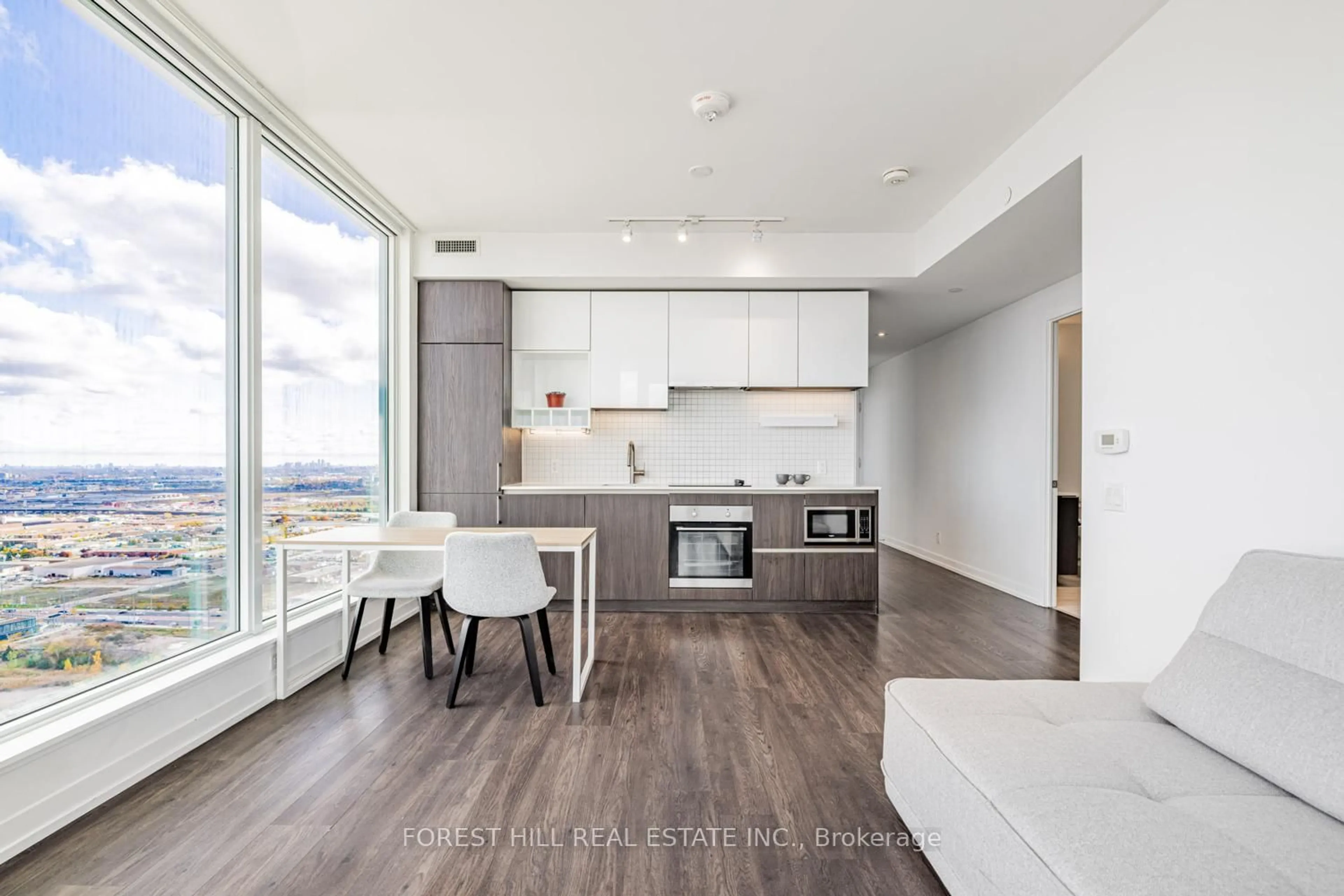 Open concept kitchen, wood/laminate floor for 898 Portage Pkwy #4702, Vaughan Ontario L4K 0J6