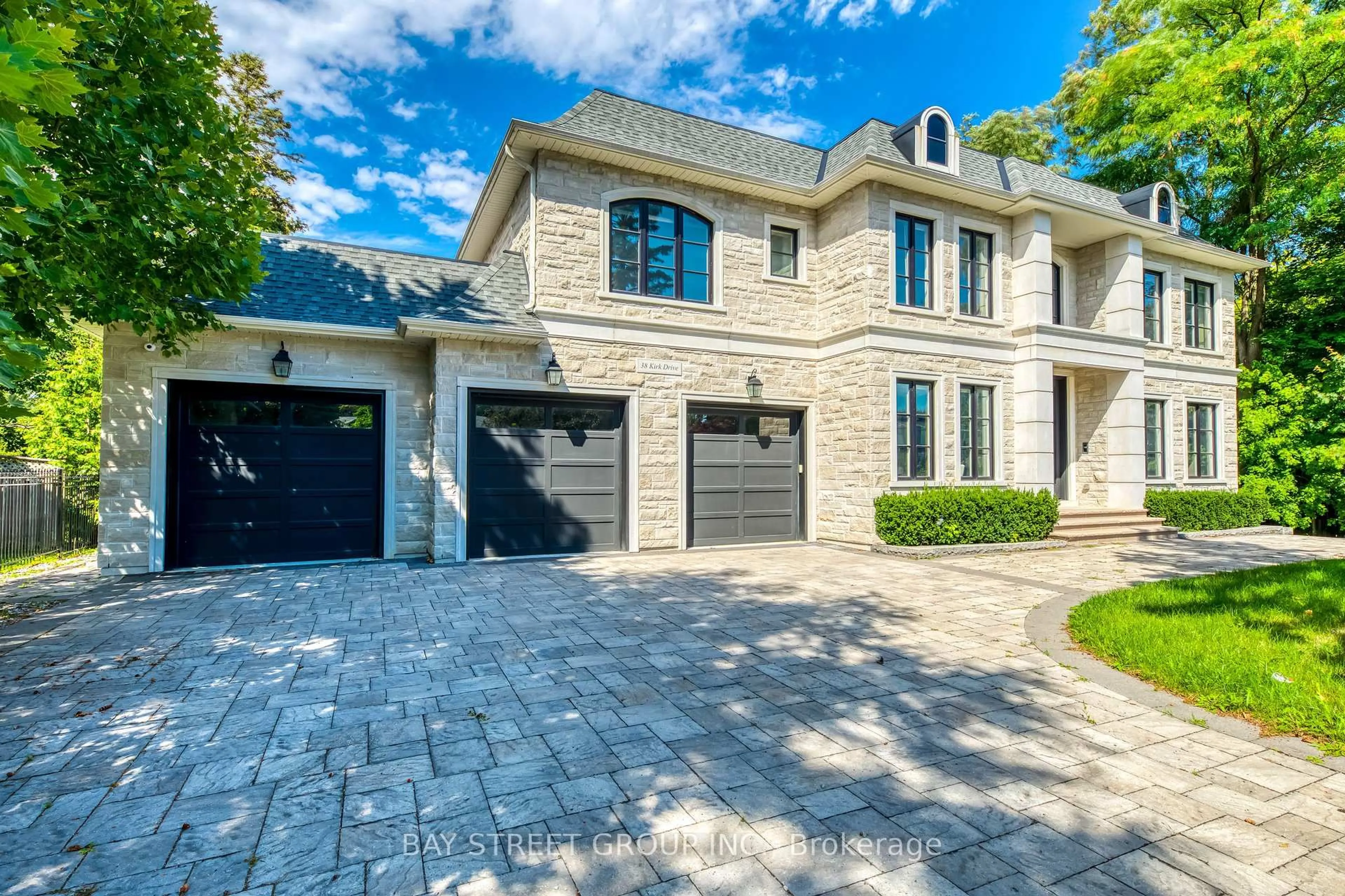 Home with brick exterior material, street for 38 Kirk Dr, Markham Ontario L3T 3L1
