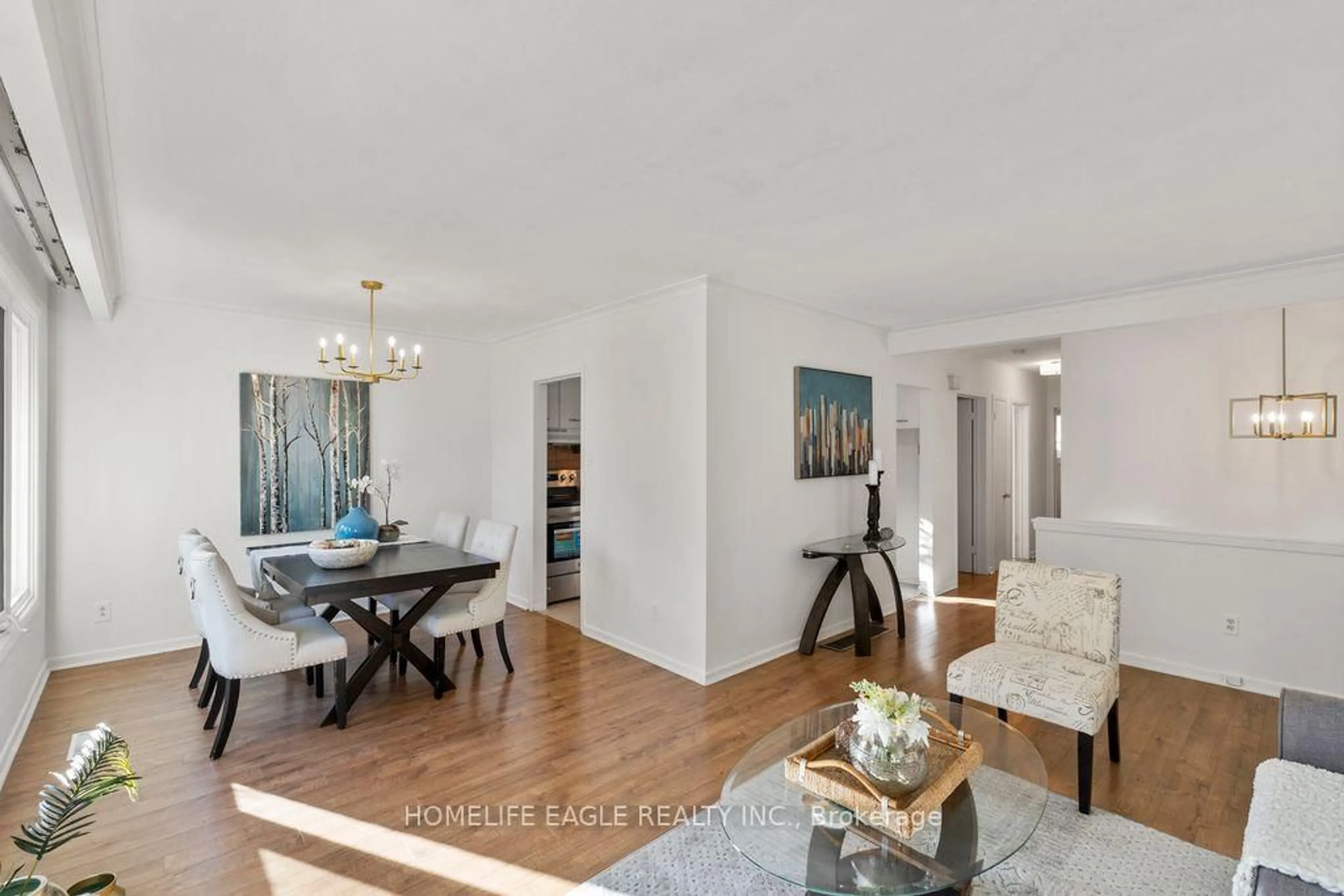 Living room with furniture, wood/laminate floor for 223 Cherrywood Dr, Newmarket Ontario L3Y 2Y1