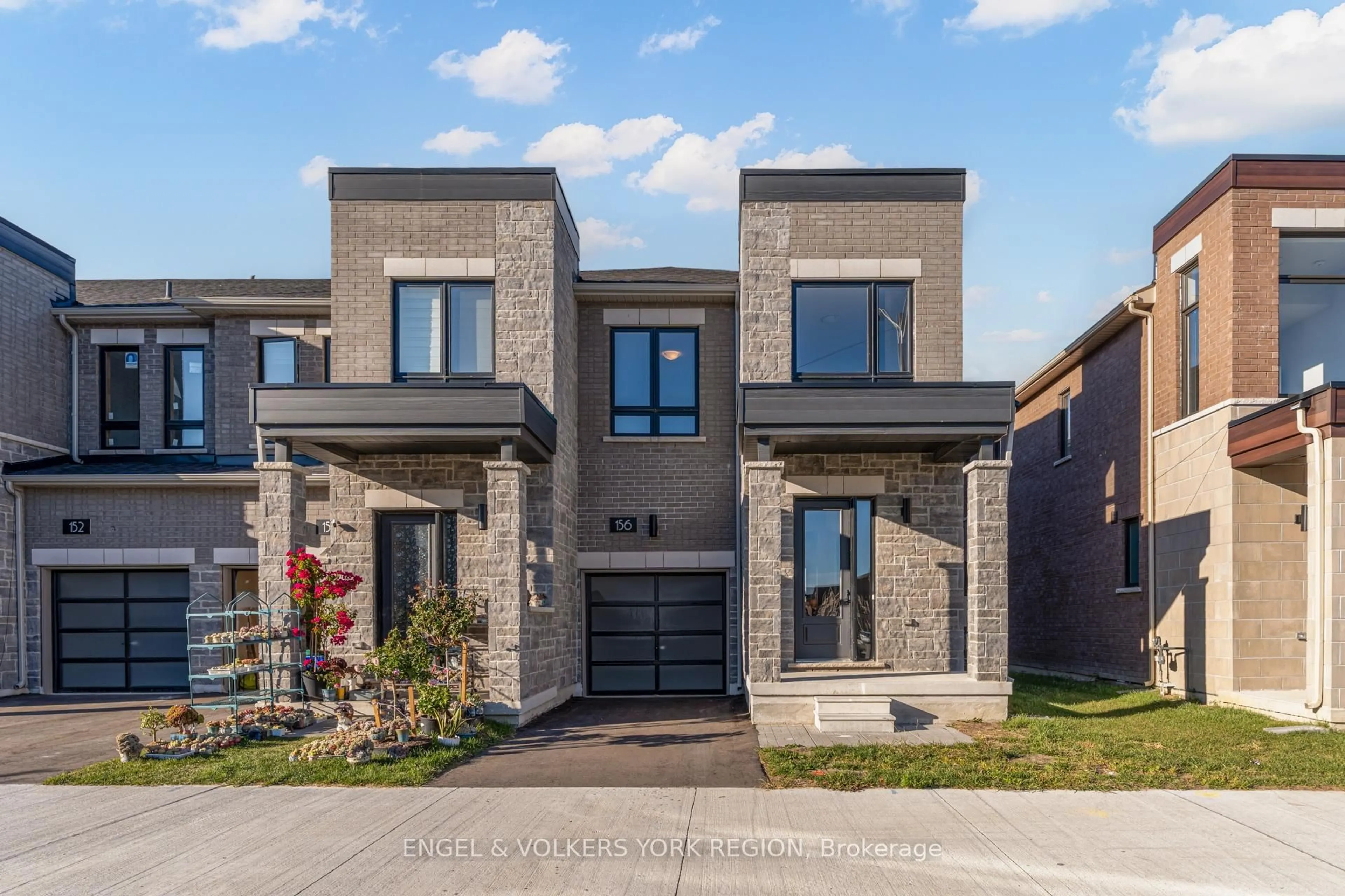 Home with brick exterior material, street for 156 Mumbai Dr, Markham Ontario L3S 3K5