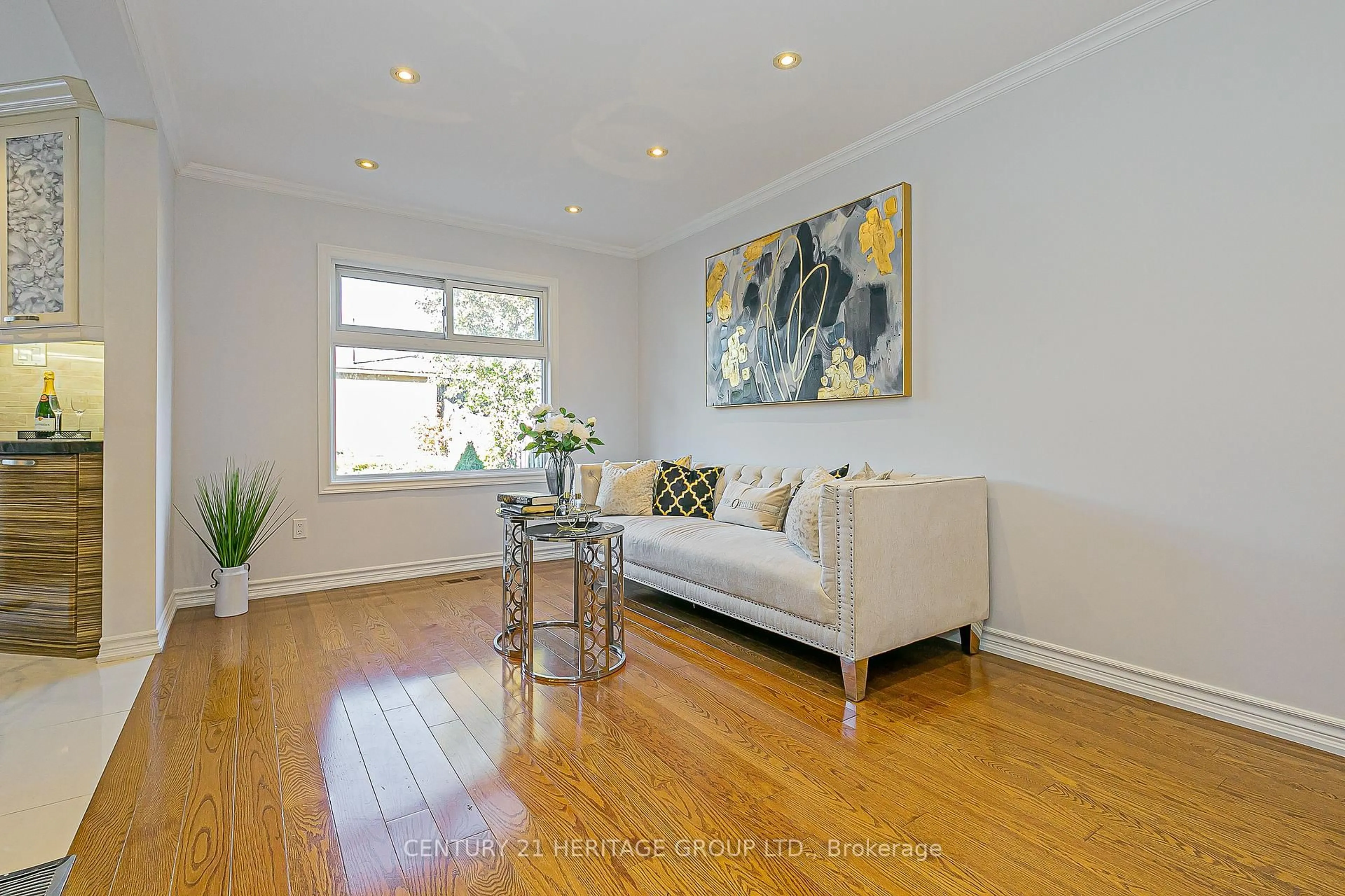 Living room with furniture, wood/laminate floor for 32 Mountfield Cres, Vaughan Ontario L4J 7E8