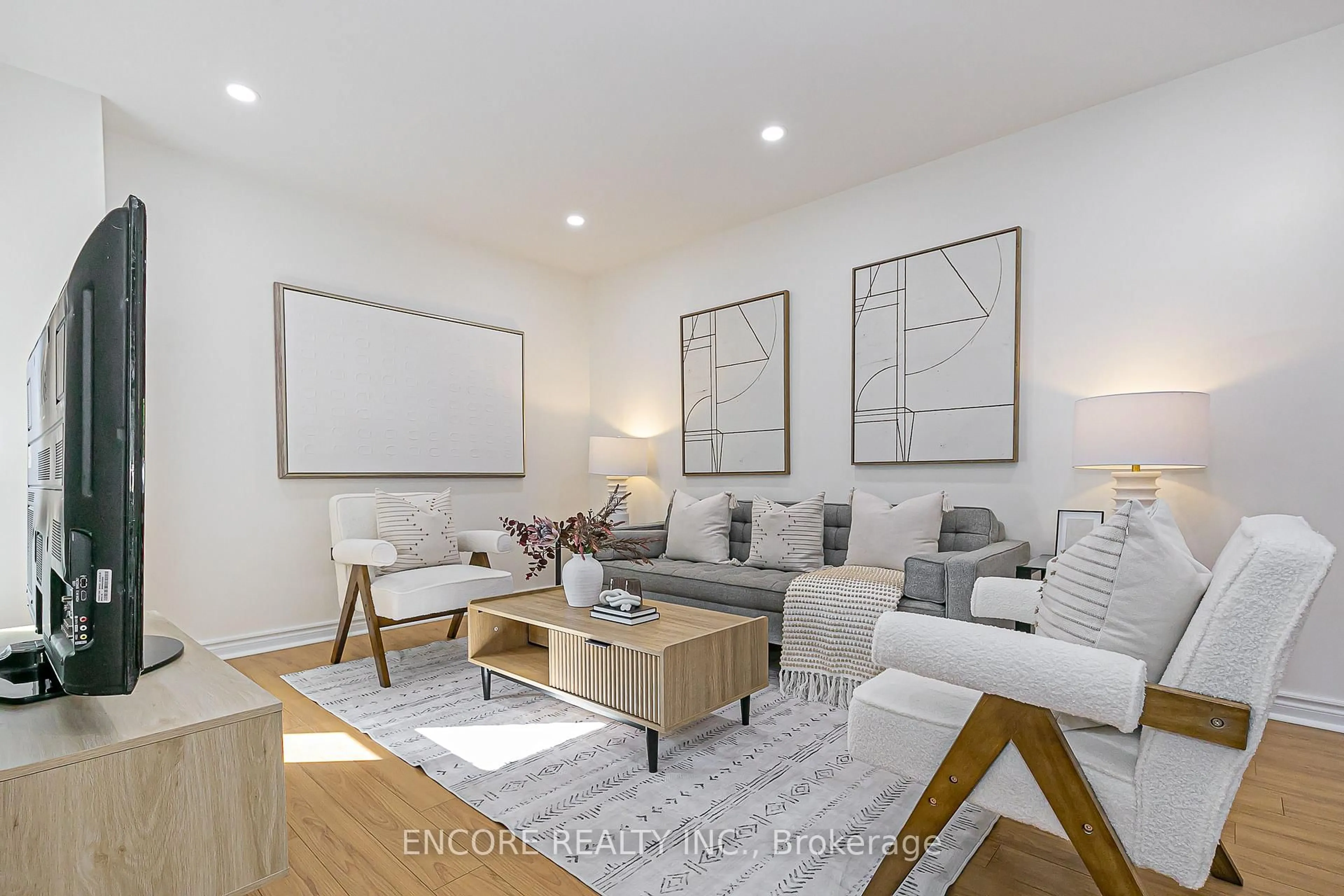 Living room with furniture, wood/laminate floor for 67 Cottsmore Cres, Markham Ontario L3R 3X8