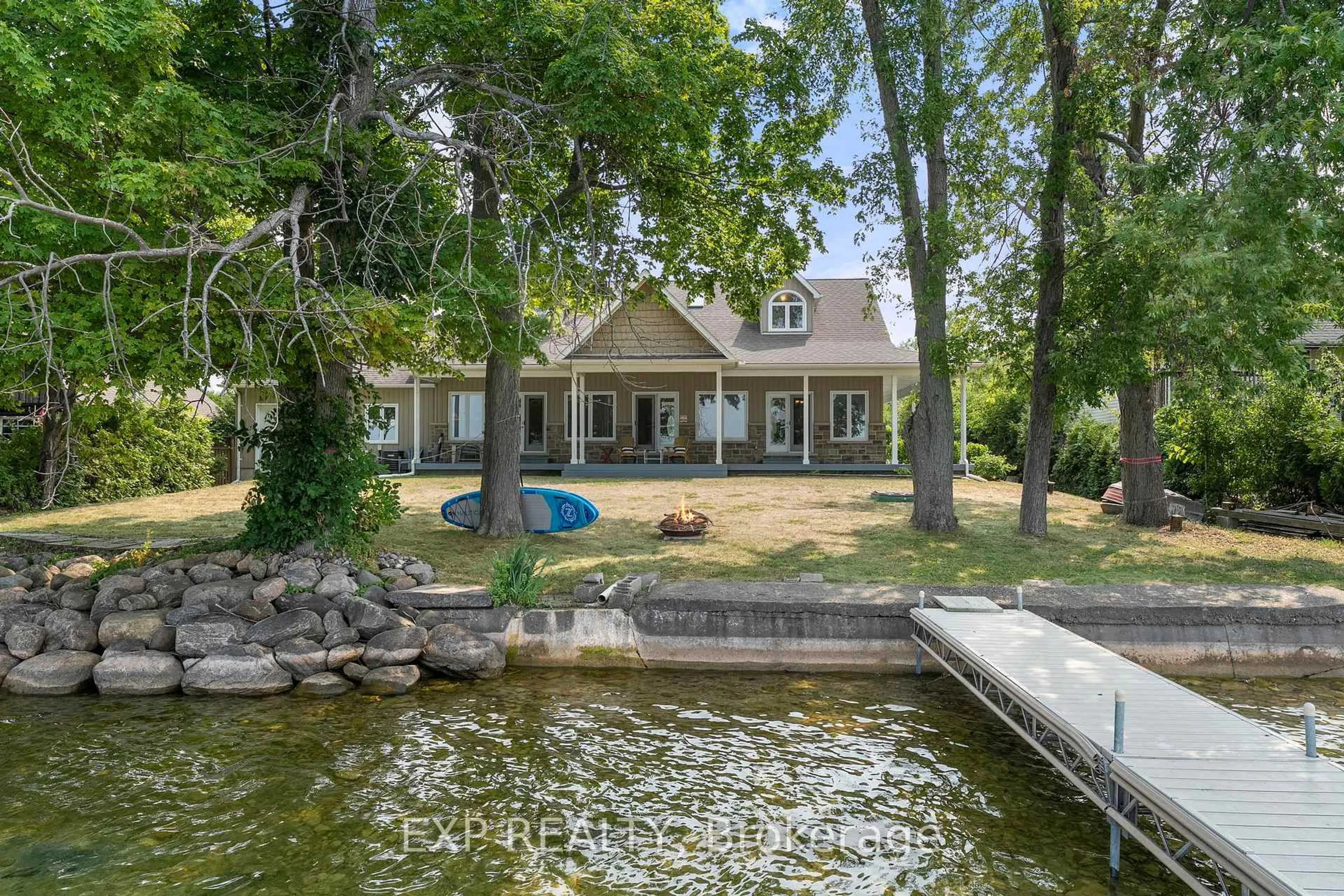 A pic from outside/outdoor area/front of a property/back of a property/a pic from drone, water/lake/river/ocean view for 22 Blue Heron Dr, Georgina Ontario L0E 1N0