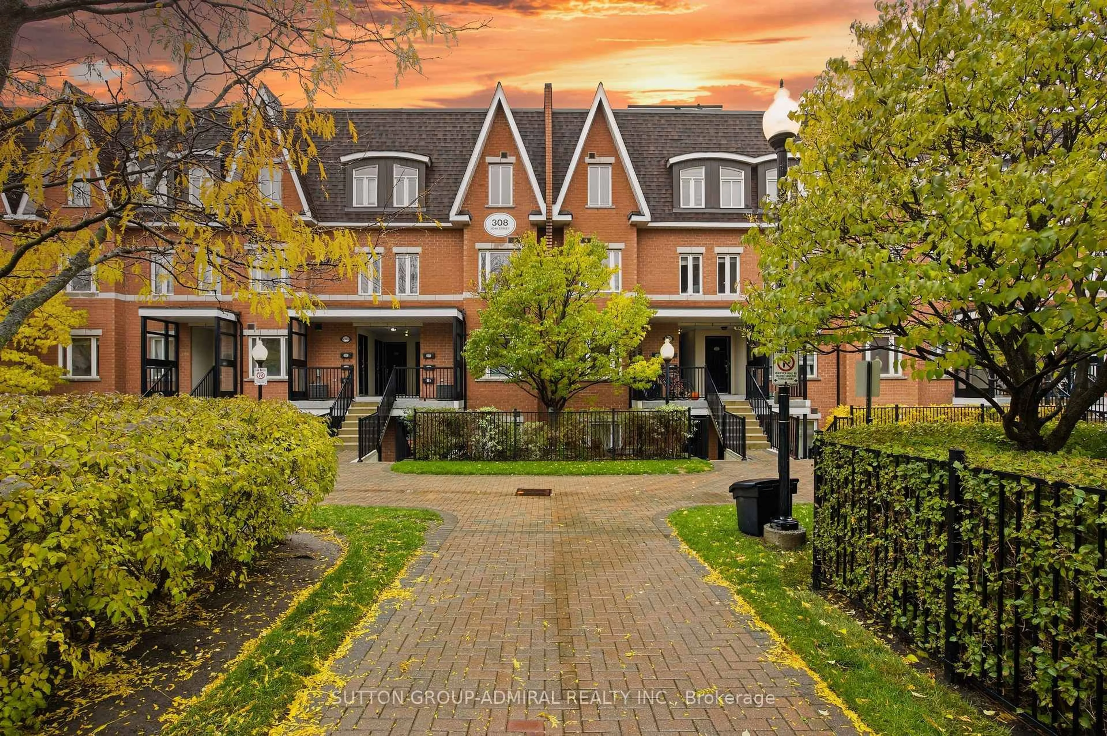 Home with brick exterior material, street for 308 John St #216, Markham Ontario L3T 0A7