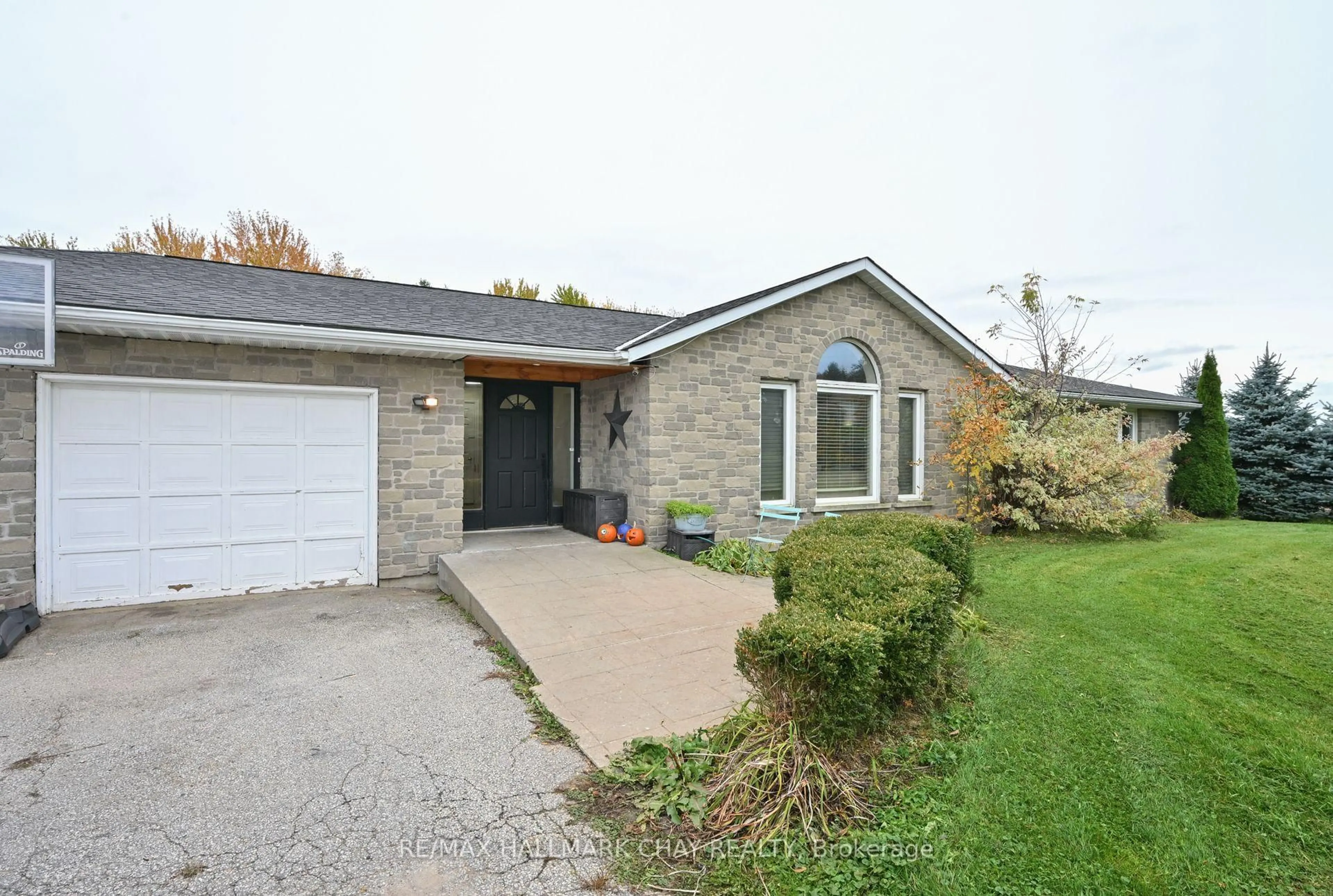 Home with brick exterior material, street for 7067 5th Sideroad, New Tecumseth Ontario L9R 1V2