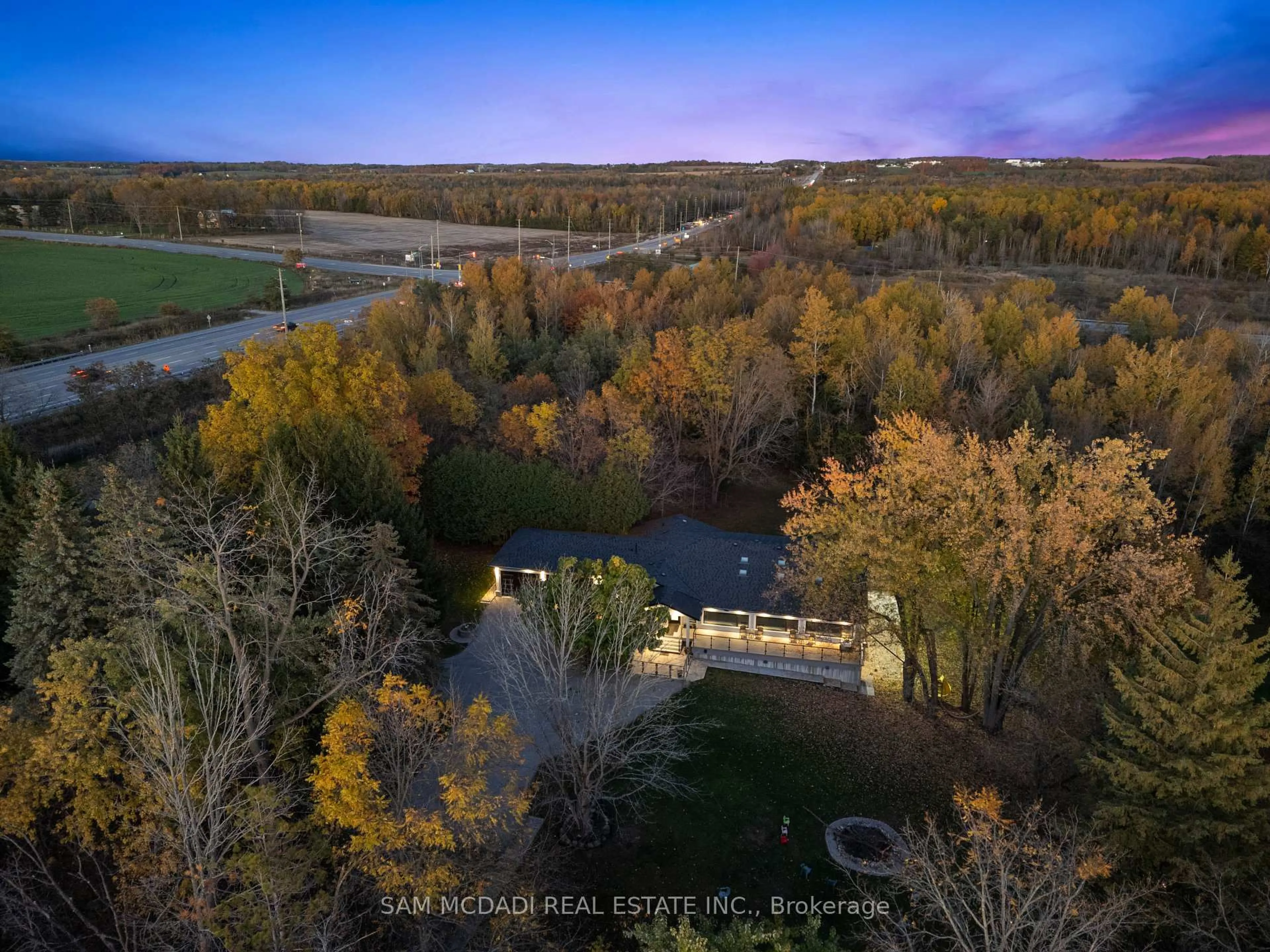 A pic from outside/outdoor area/front of a property/back of a property/a pic from drone, forest/trees view for 2993 Innisfil Beach Rd, Innisfil Ontario L9S 4C3