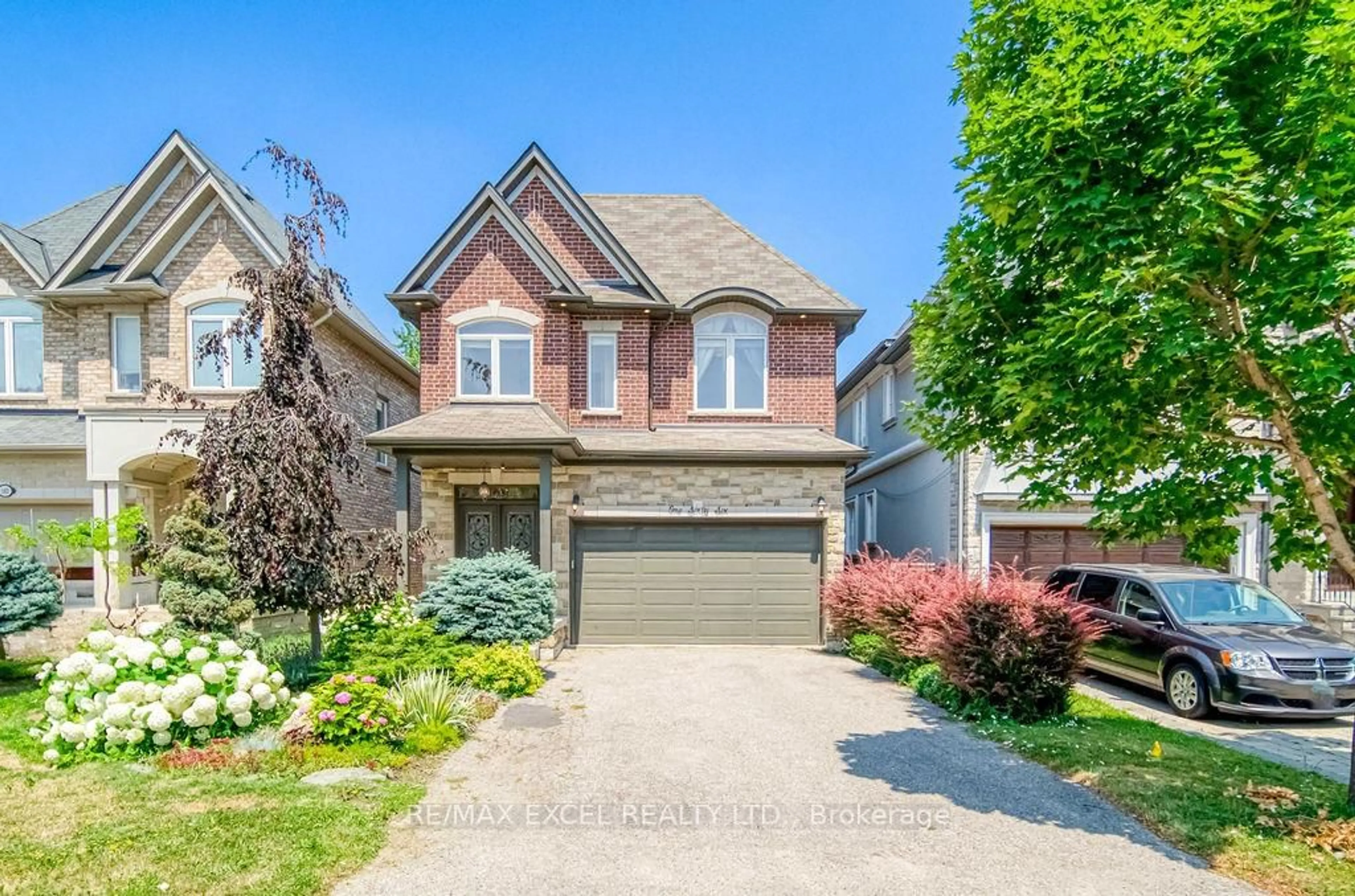 Home with brick exterior material, street for 166 Townsgate Dr, Vaughan Ontario L4J 8J5