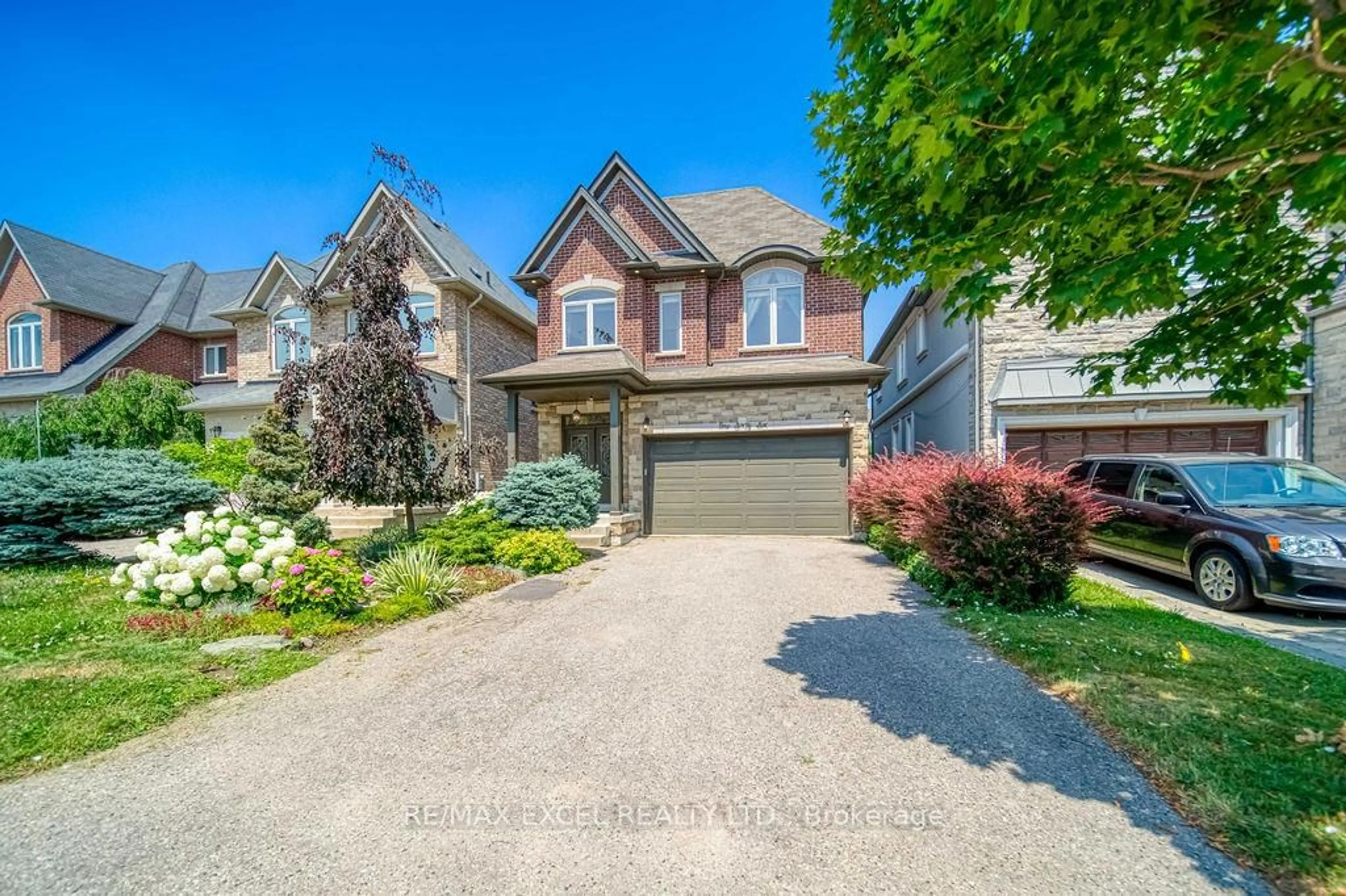 Home with brick exterior material, street for 166 Townsgate Dr, Vaughan Ontario L4J 8J5