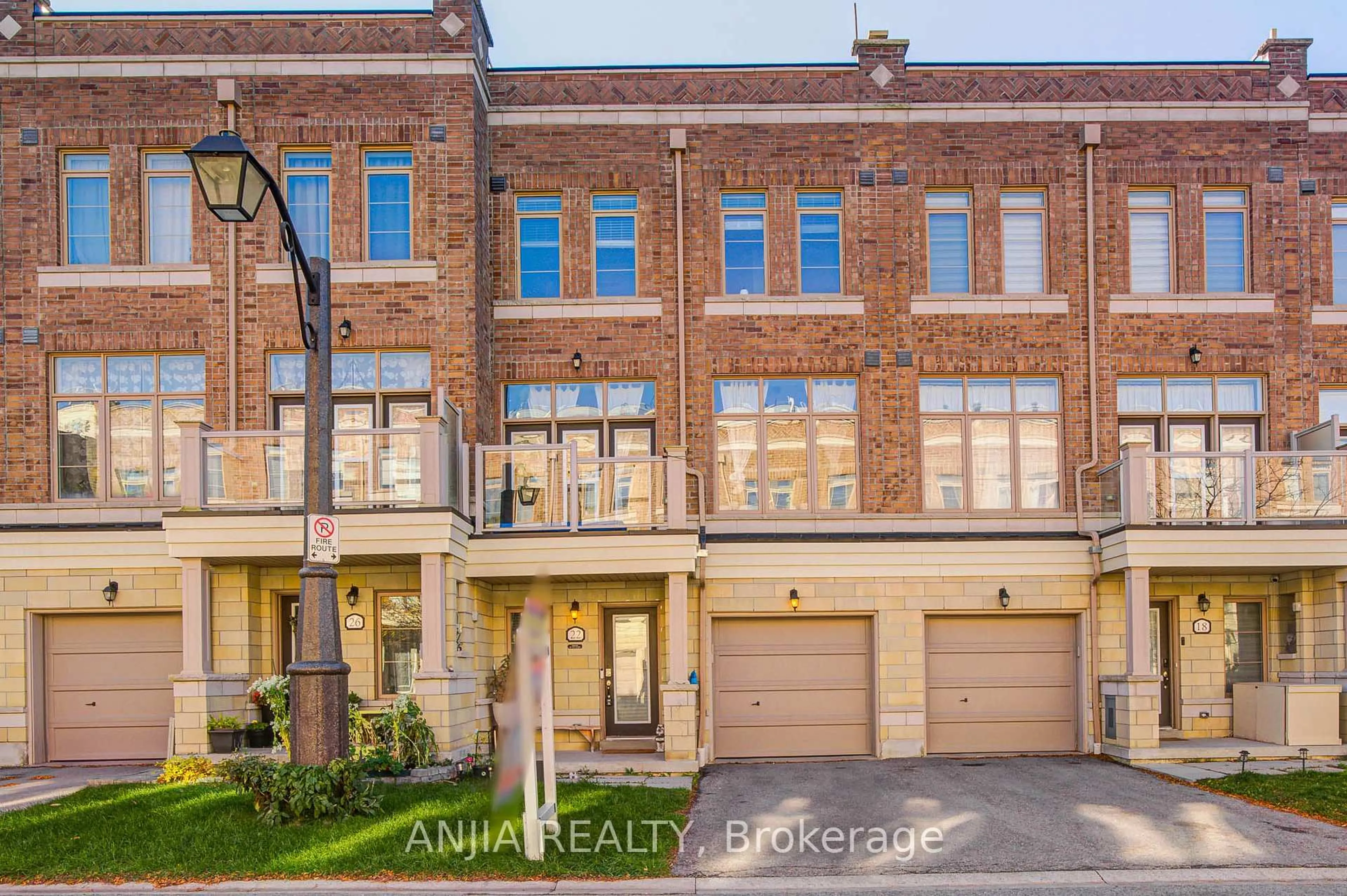 Home with brick exterior material, street for 22 Arborea Lane, Whitchurch-Stouffville Ontario L4A 1X1