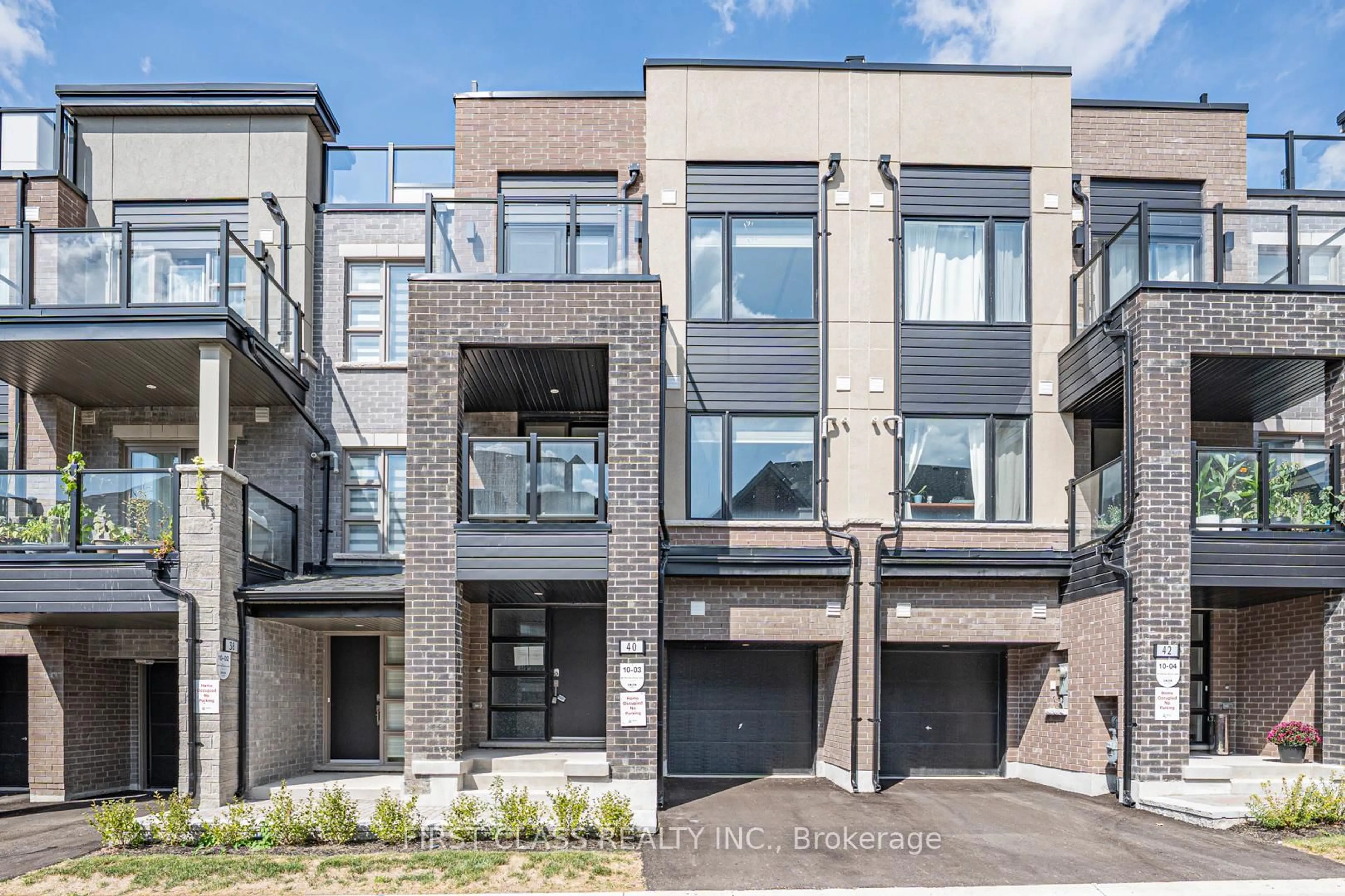 Home with brick exterior material, street for 40 Herman Gilroy Lane, Markham Ontario L6C 3L7