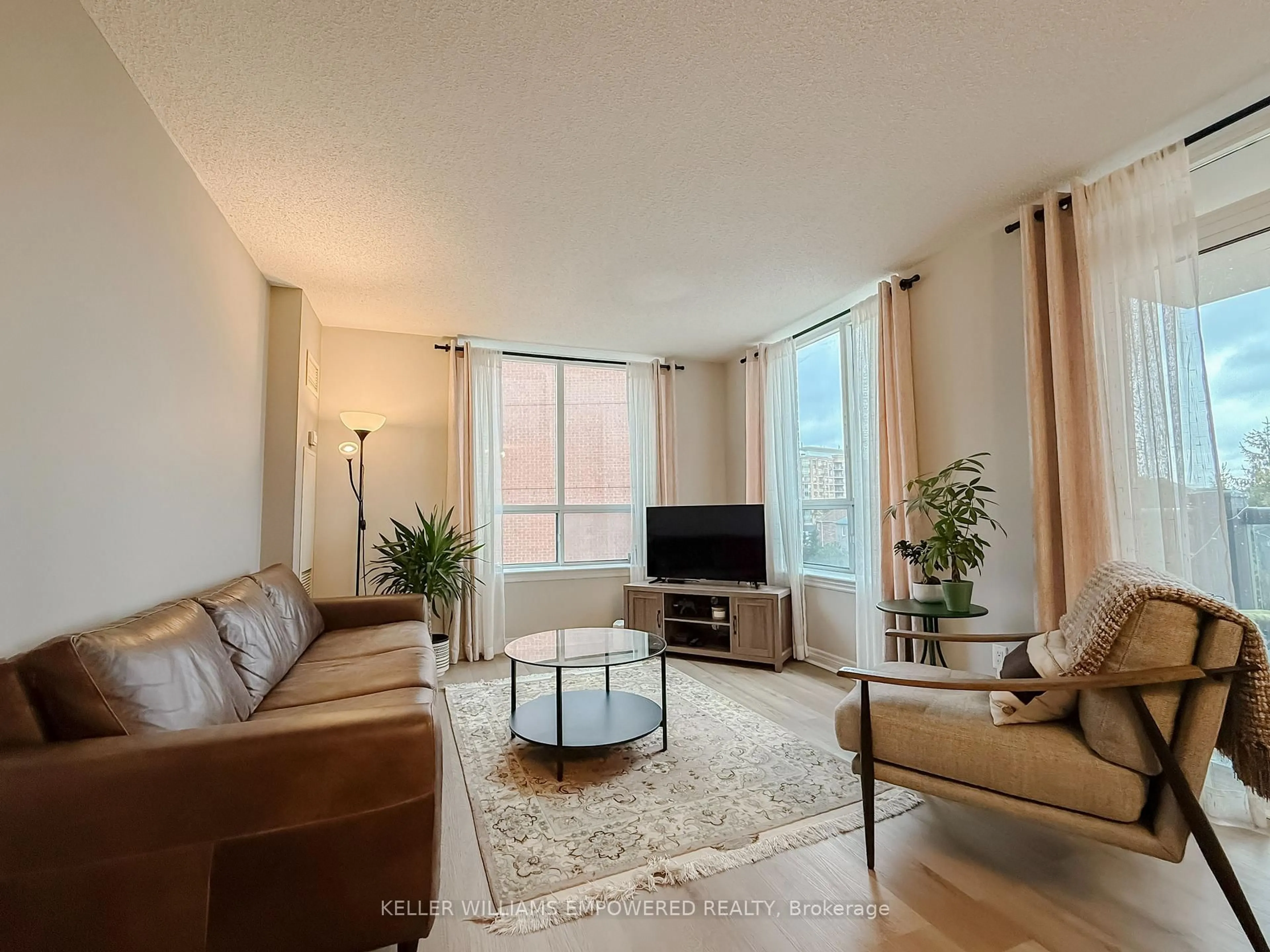 Living room with furniture, unknown for 51 Times Ave #302, Markham Ontario L3T 7X7