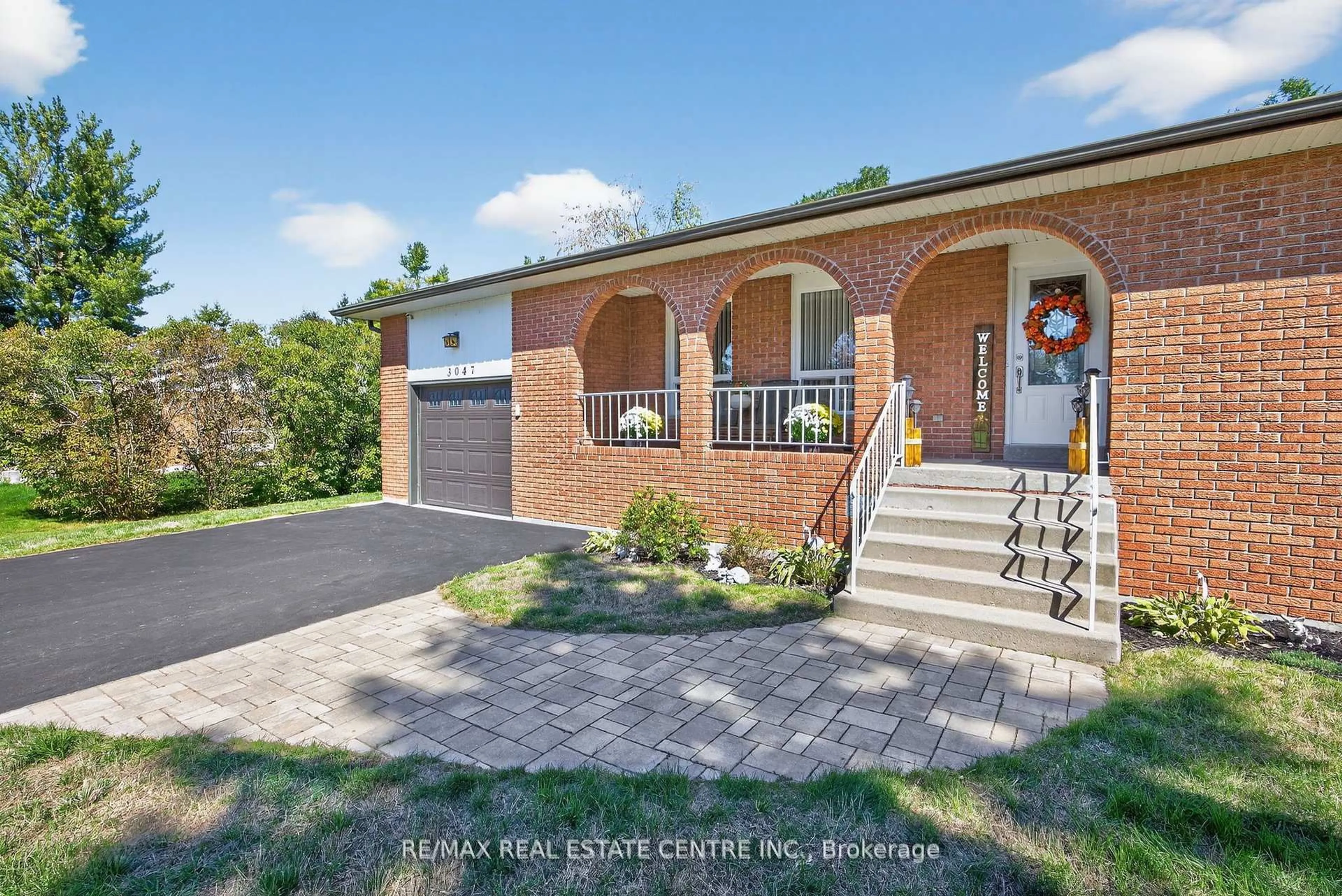 Home with brick exterior material, street for 3047 Sandy Cove Dr, Innisfil Ontario L9S 2K1
