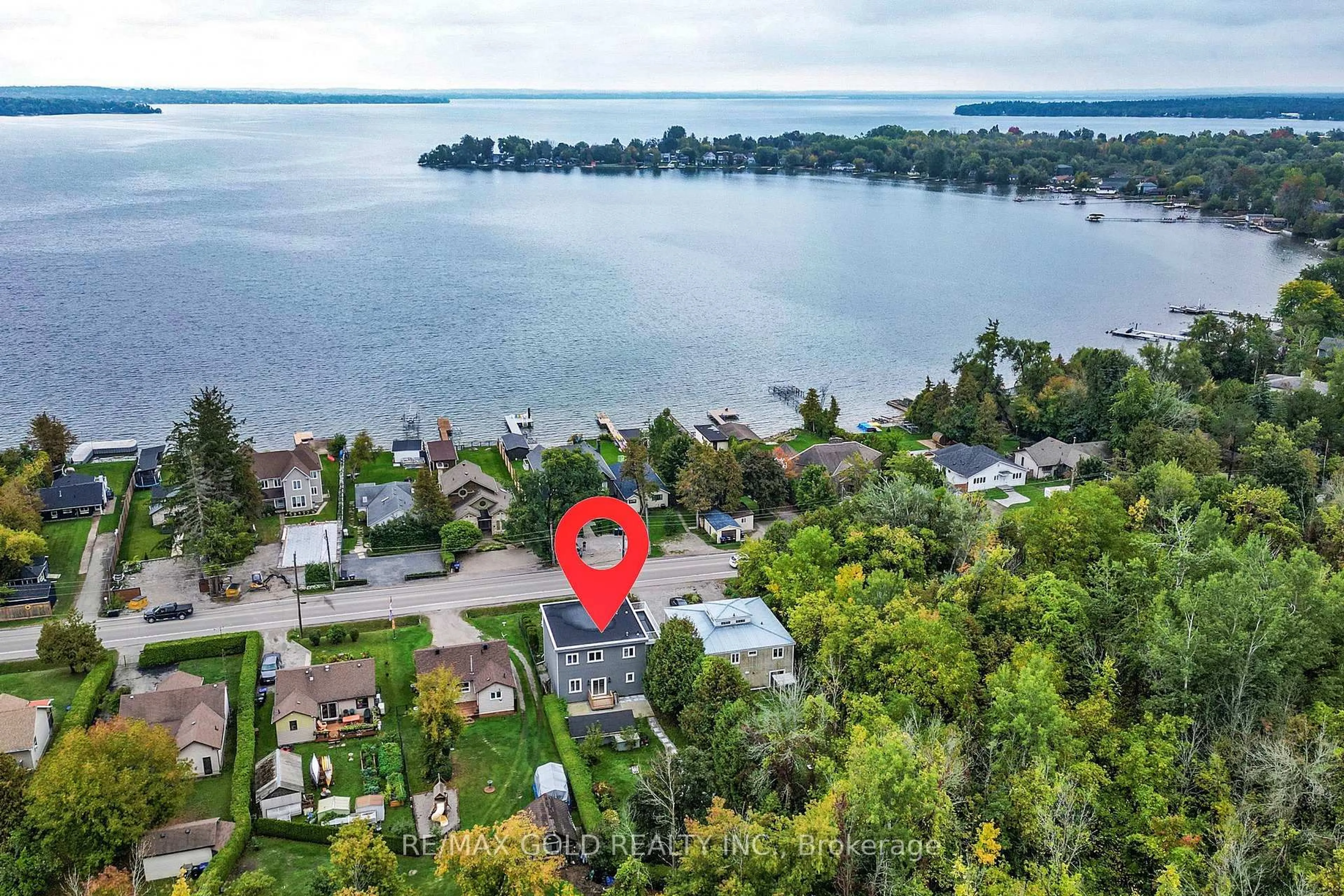 A pic from outside/outdoor area/front of a property/back of a property/a pic from drone, water/lake/river/ocean view for 1372 Maple Rd, Innisfil Ontario L0L 1C0