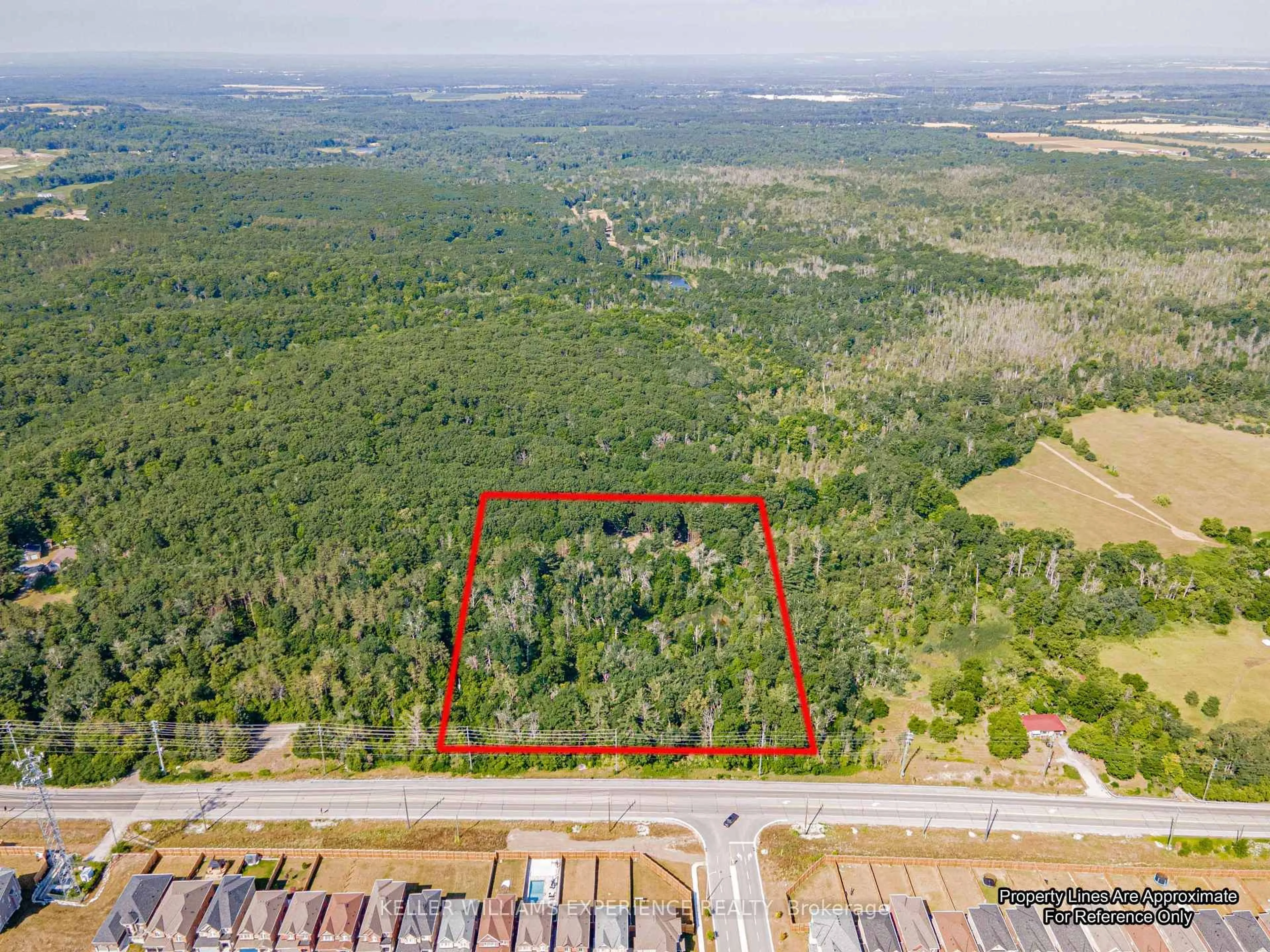 A pic from outside/outdoor area/front of a property/back of a property/a pic from drone, forest/trees view for 8294 County 27 Rd, Essa Ontario L4N 9C4
