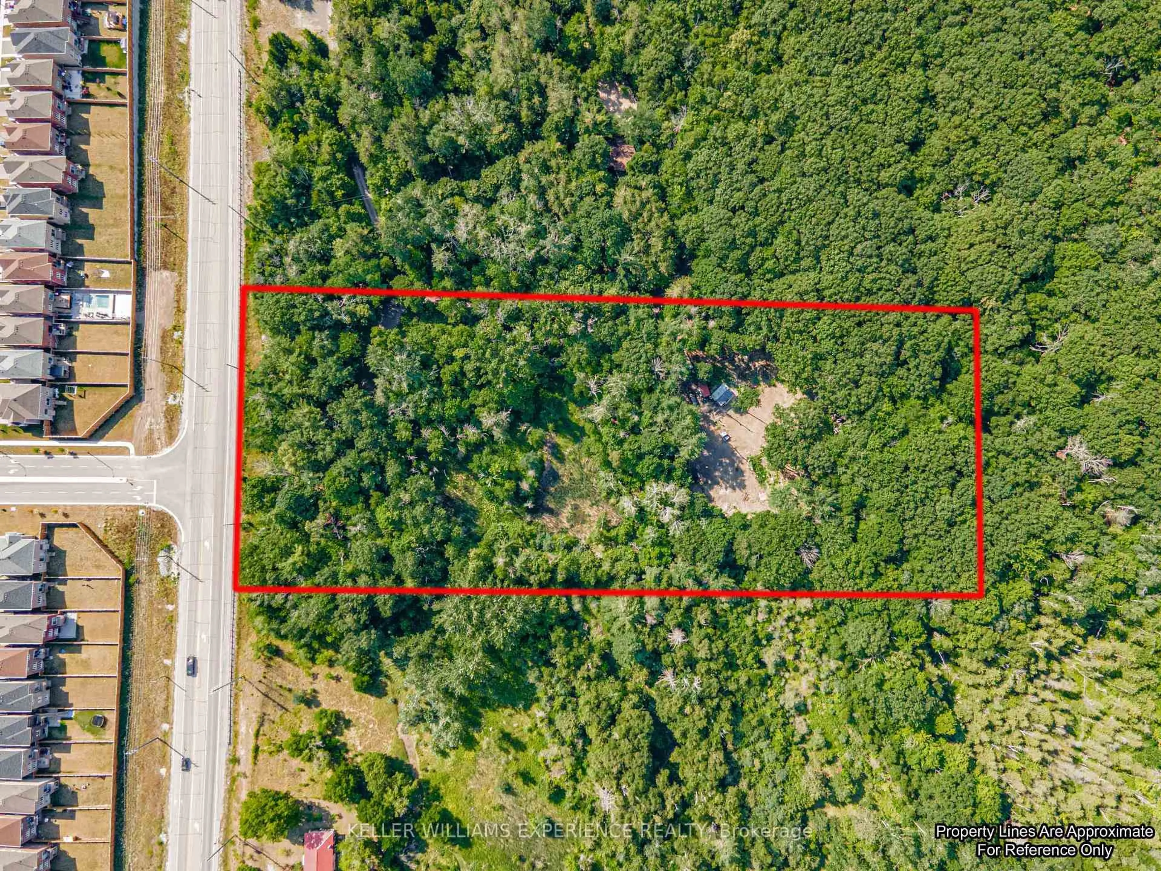 A pic from outside/outdoor area/front of a property/back of a property/a pic from drone, forest/trees view for 8294 County 27 Rd, Essa Ontario L4N 9C4