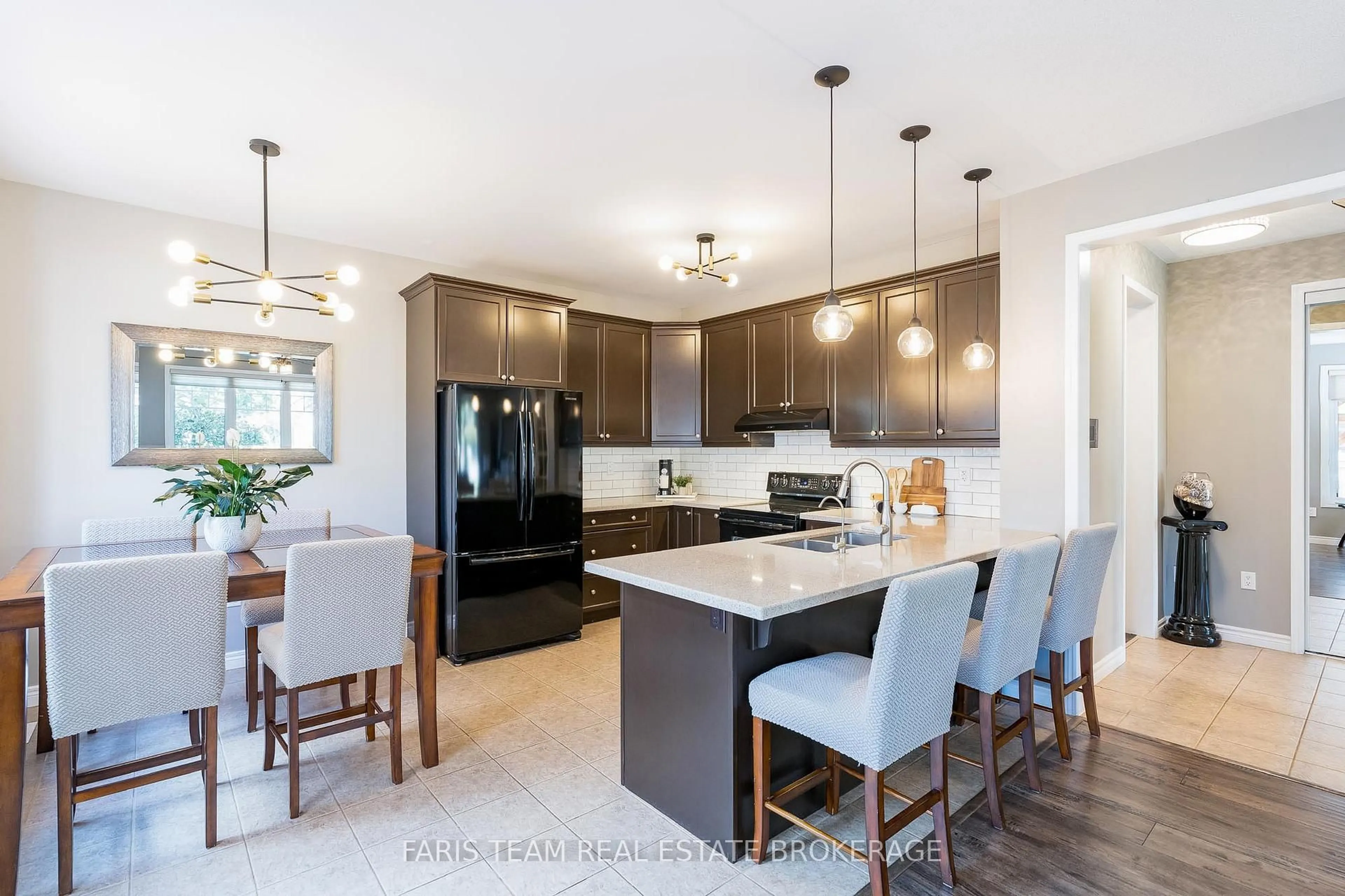 Open concept kitchen, ceramic/tile floor for 38 Paddison Pl, New Tecumseth Ontario L9R 0J5