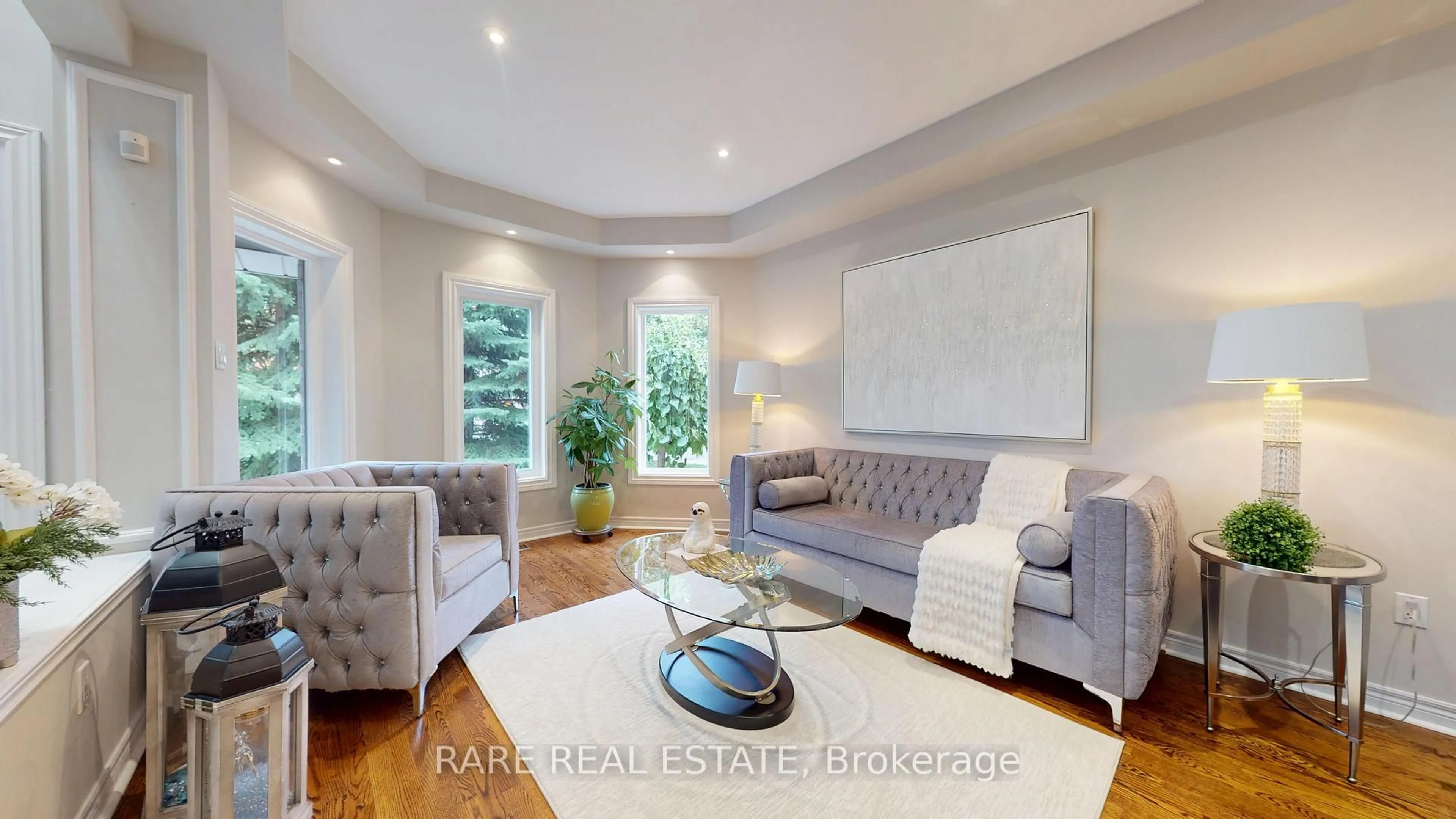 Living room with furniture, wood/laminate floor for 68 Kirkbride Cres, Vaughan Ontario L6A 2J5