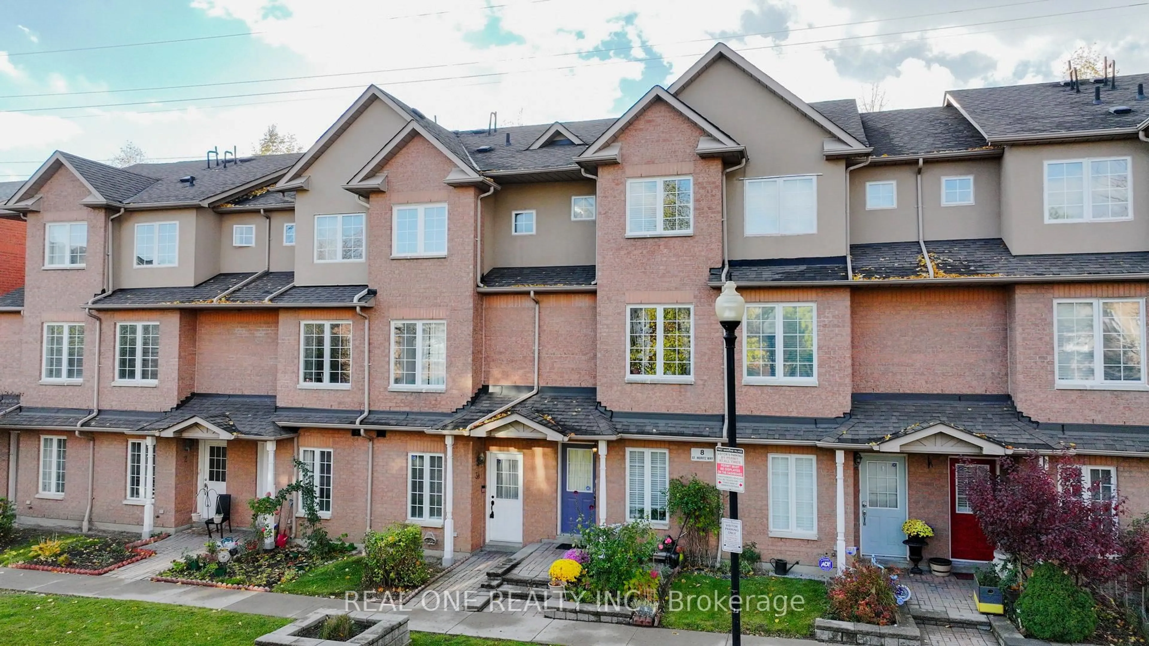 A pic from outside/outdoor area/front of a property/back of a property/a pic from drone, street for 8 St Moritz Way #5, Markham Ontario L3R 4E8