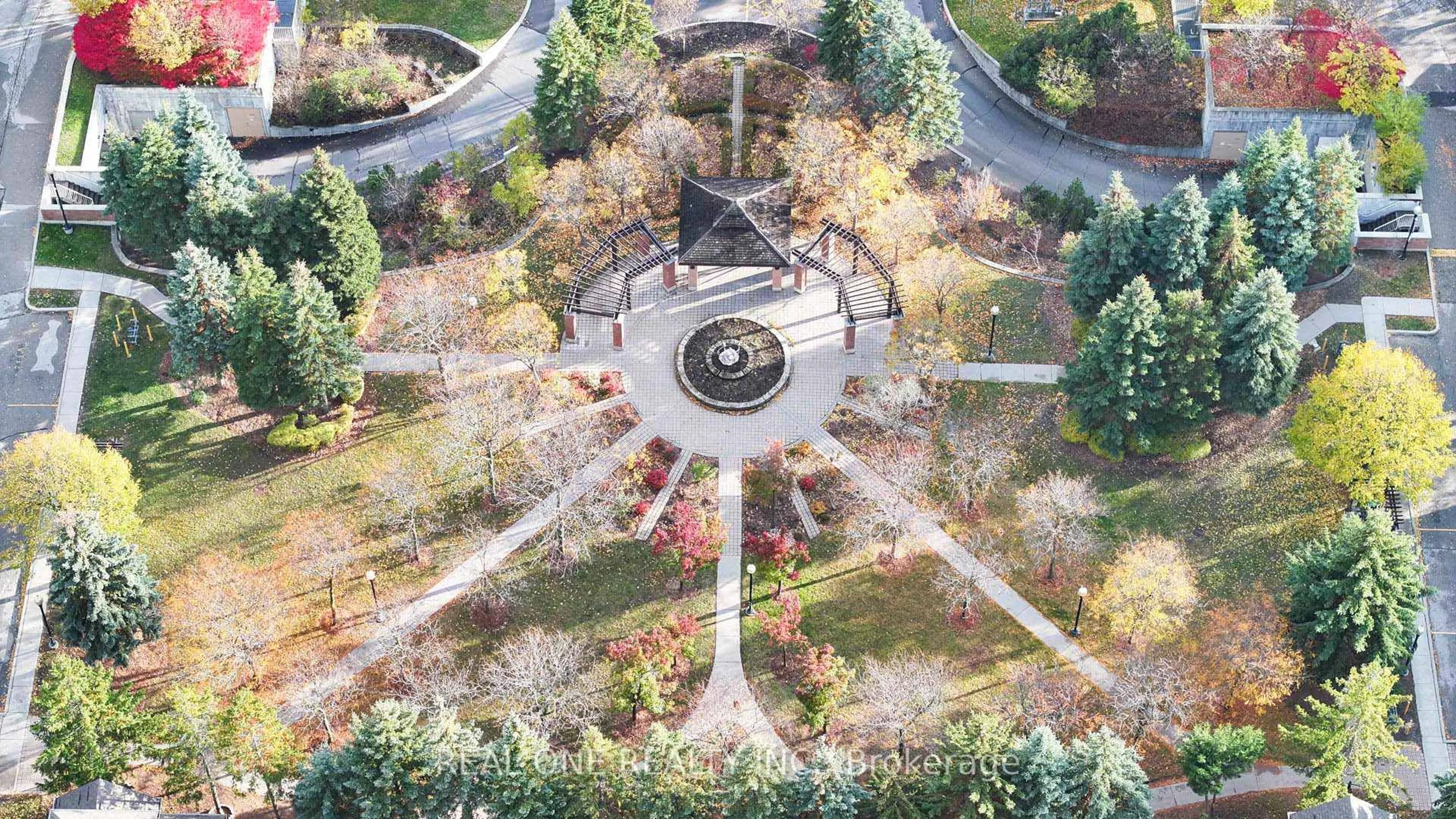 A pic from outside/outdoor area/front of a property/back of a property/a pic from drone, forest/trees view for 8 St Moritz Way #5, Markham Ontario L3R 4E8