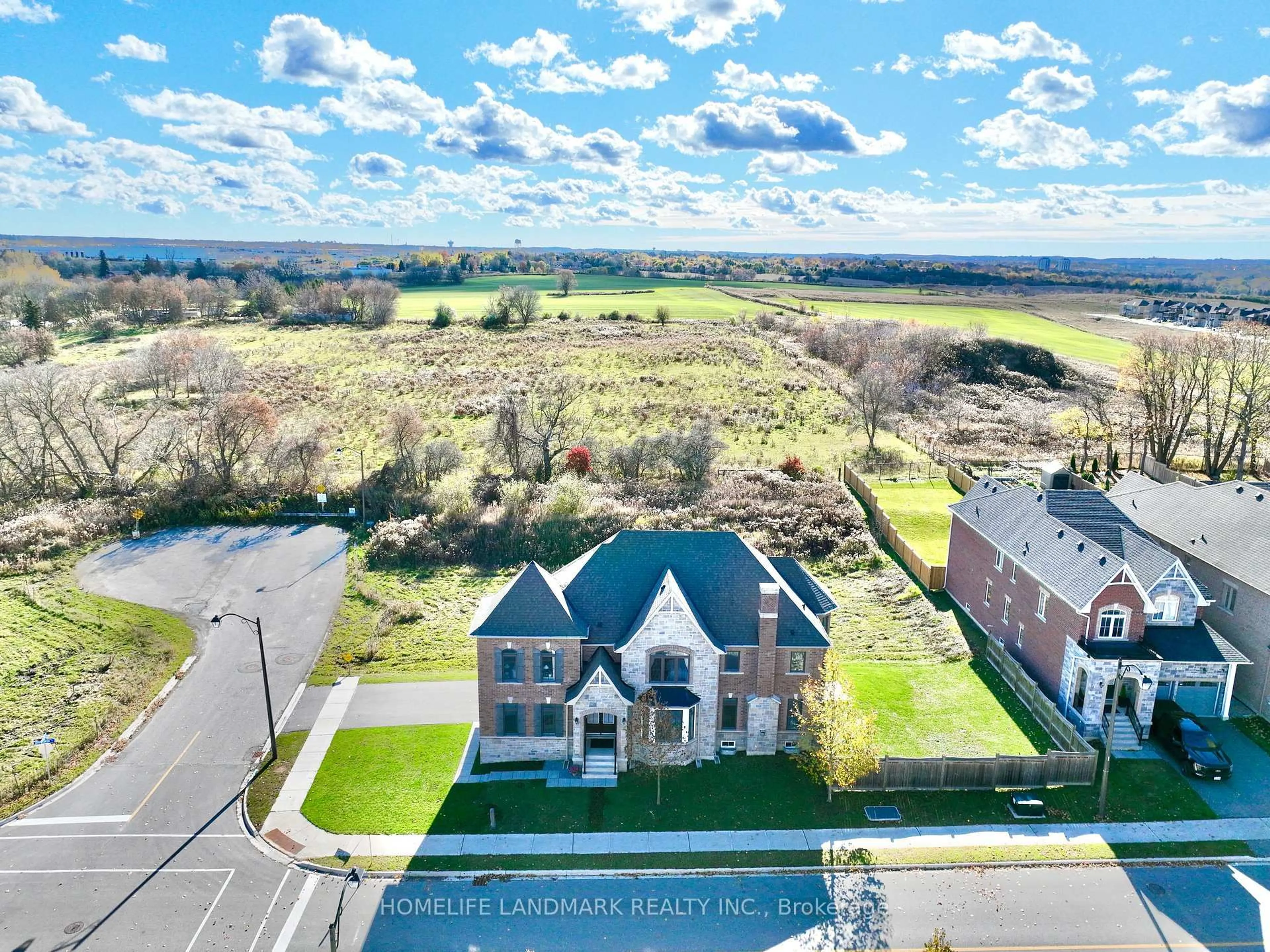 A pic from outside/outdoor area/front of a property/back of a property/a pic from drone, water/lake/river/ocean view for 174 Sharon Creek Dr, East Gwillimbury Ontario L9N 0P9