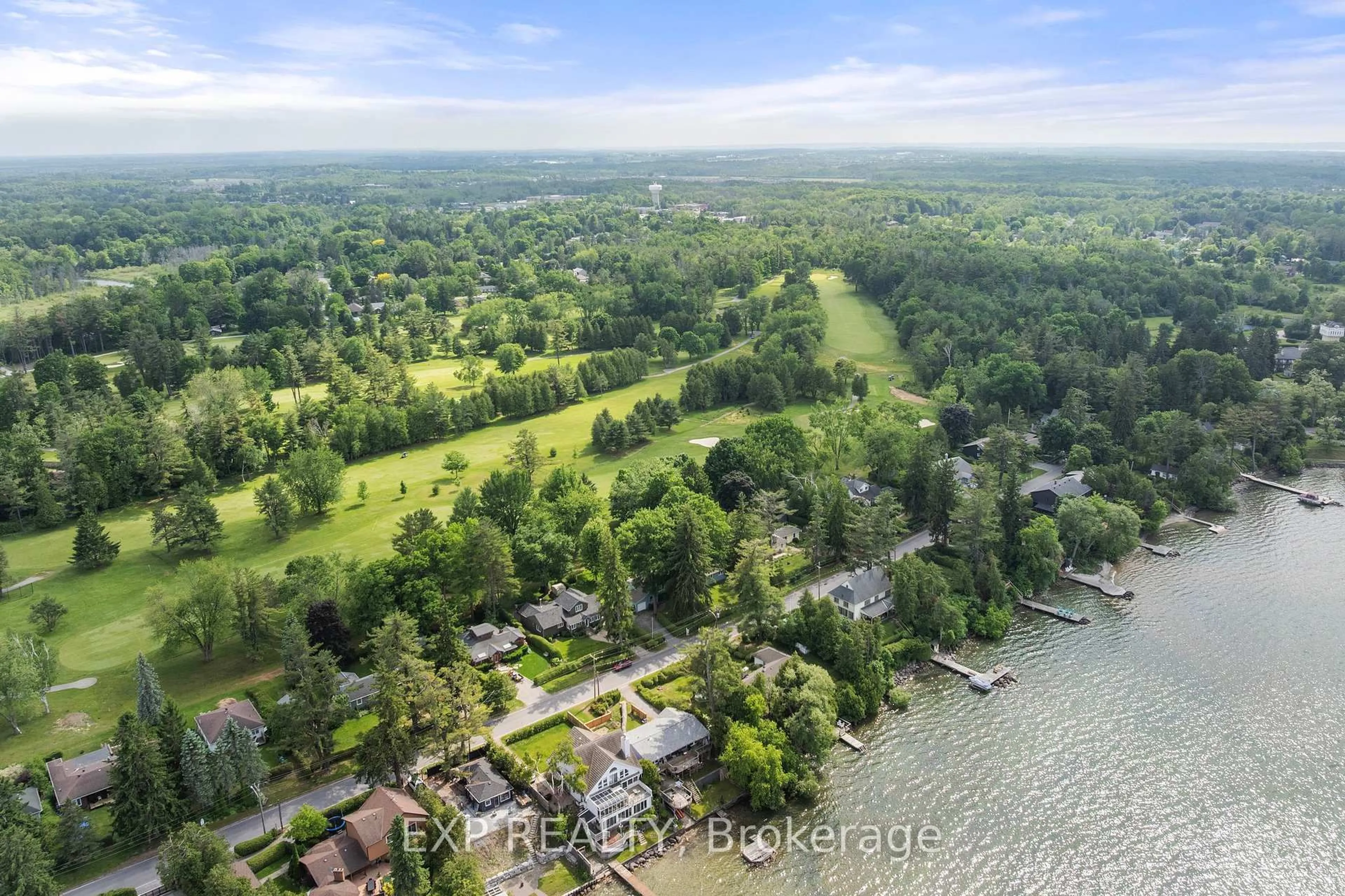 A pic from outside/outdoor area/front of a property/back of a property/a pic from drone, water/lake/river/ocean view for 101 Hedge Rd, Georgina Ontario L0E 1L0