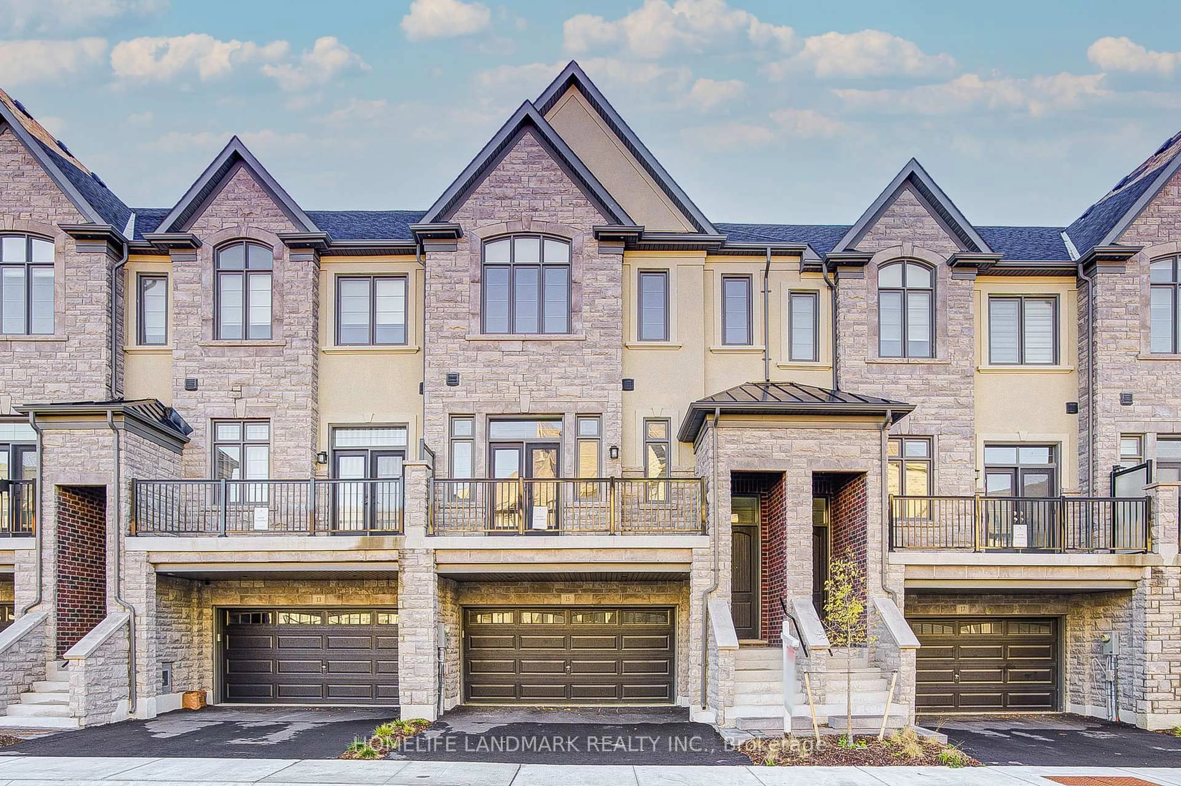 Home with brick exterior material, street for 15 West Village Lane, Markham Ontario L6C 3L5