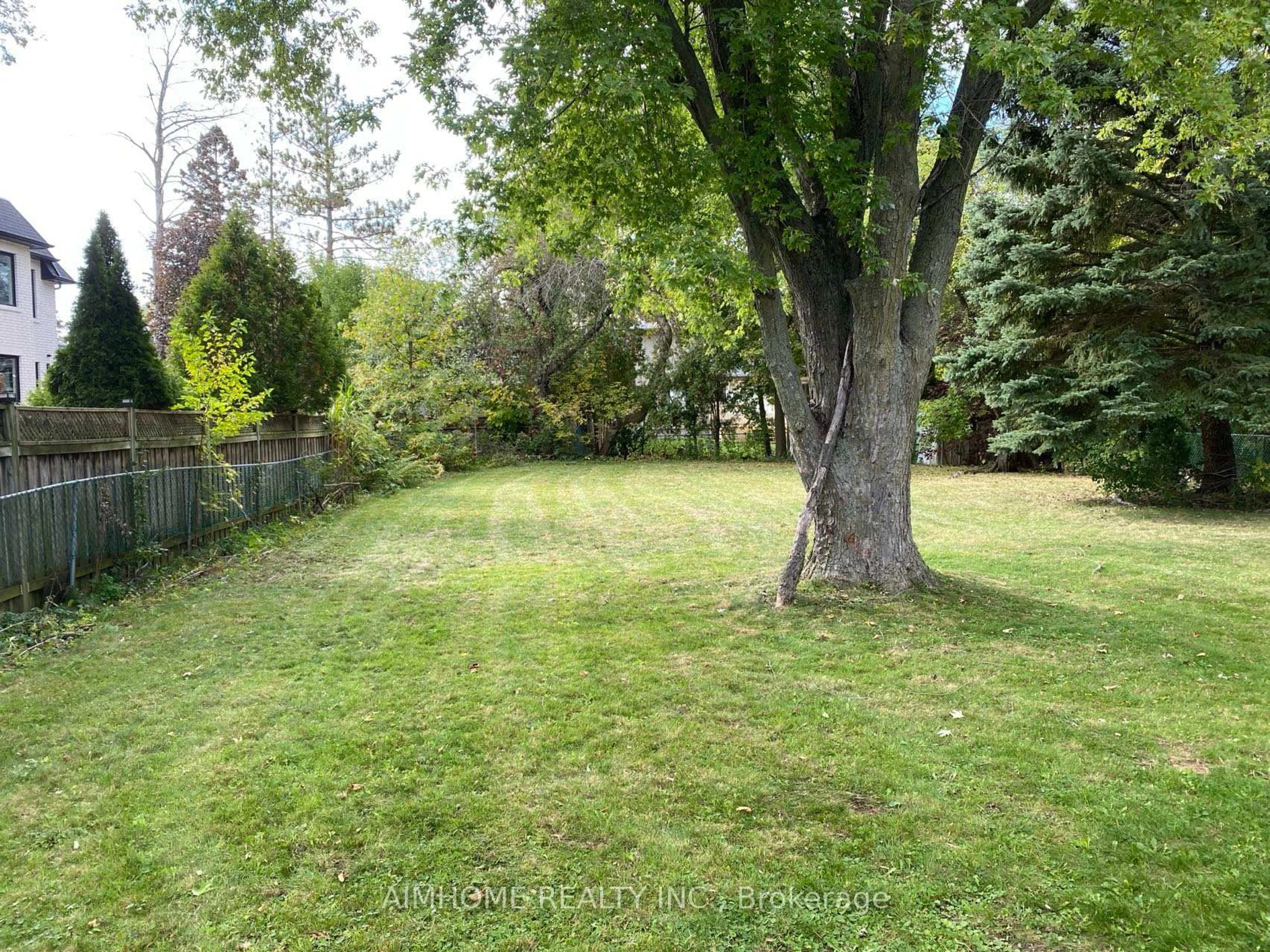 A pic from outside/outdoor area/front of a property/back of a property/a pic from drone, forest/trees view for 32 Sciberras Rd, Markham Ontario L3R 2J3