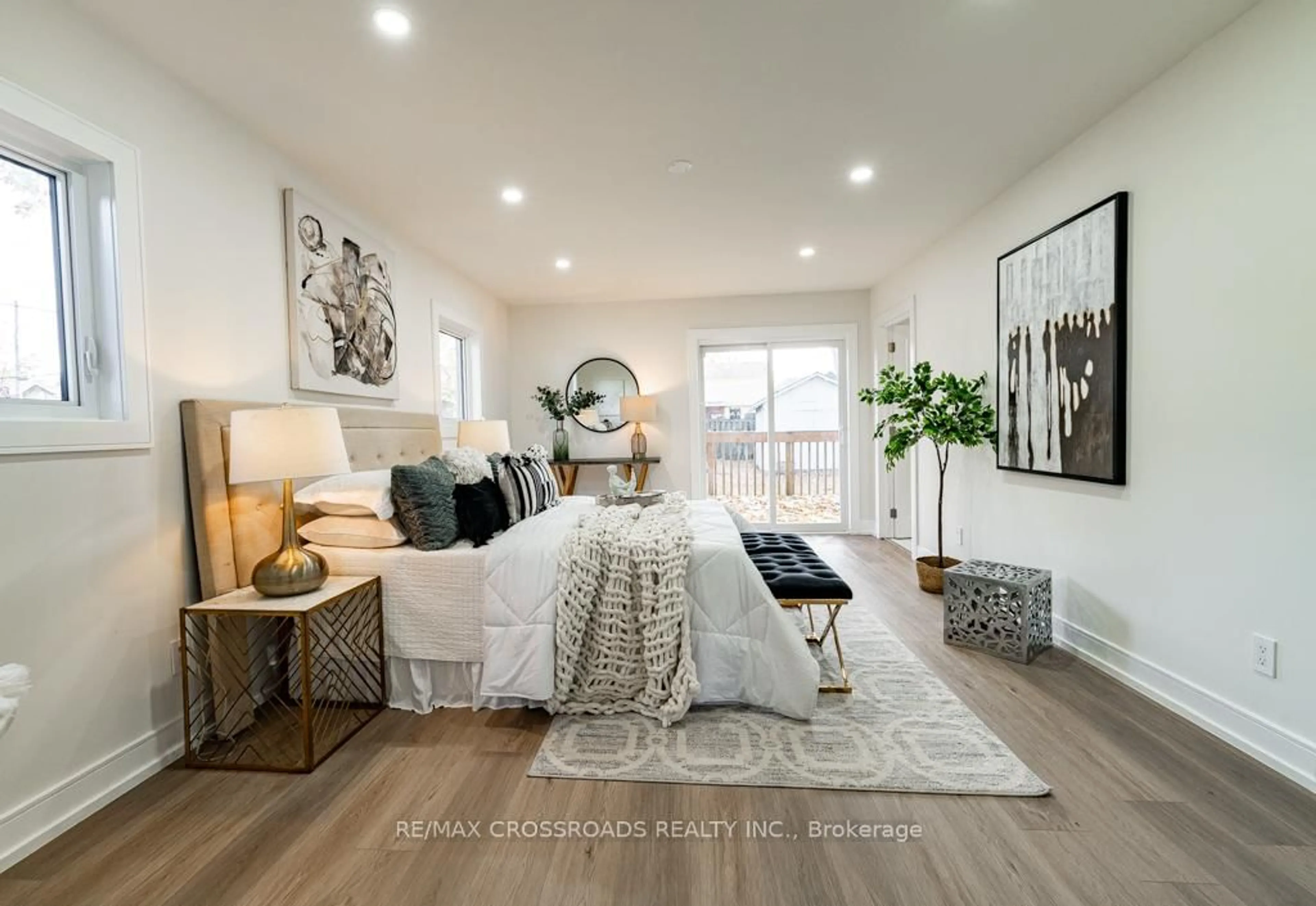 Living room with furniture, wood/laminate floor for 267 Pine Beach Dr, Georgina Ontario L4P 2V7