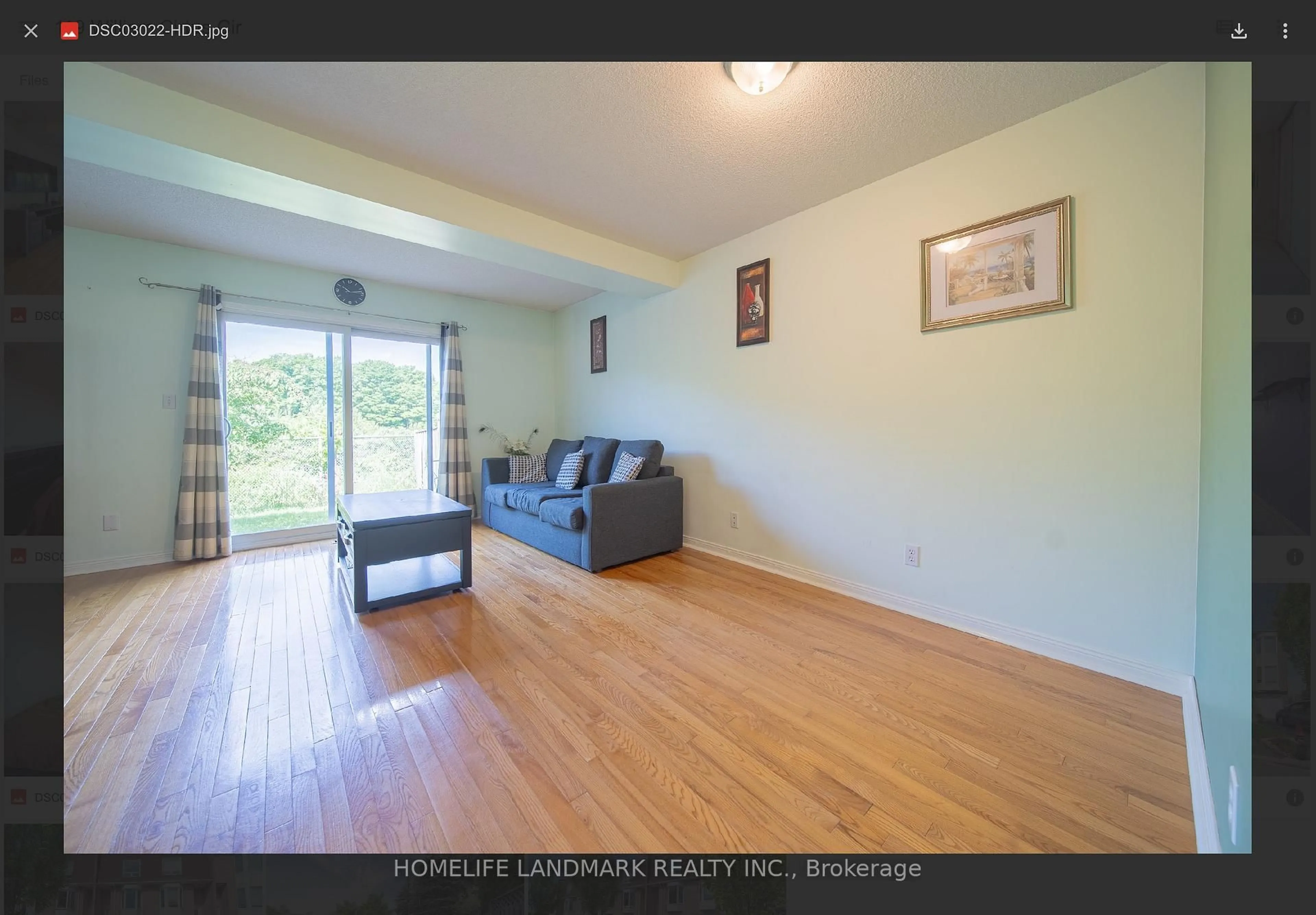 Living room with furniture, wood/laminate floor for 119 William Curtis Circ #57, Newmarket Ontario L3Y 8L8
