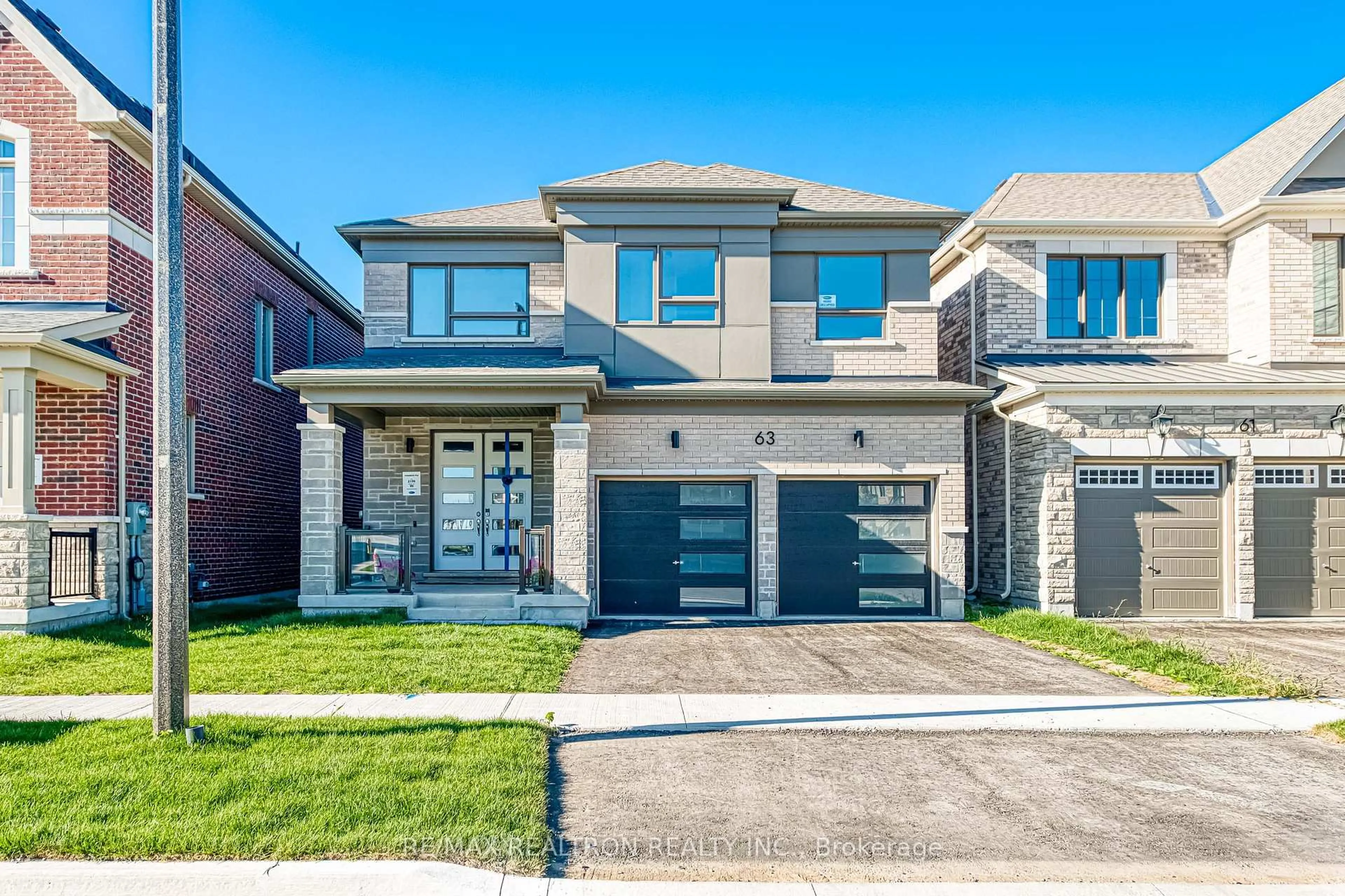 Home with brick exterior material, street for 63 Greenridge Cres, Markham Ontario L6C 3M1